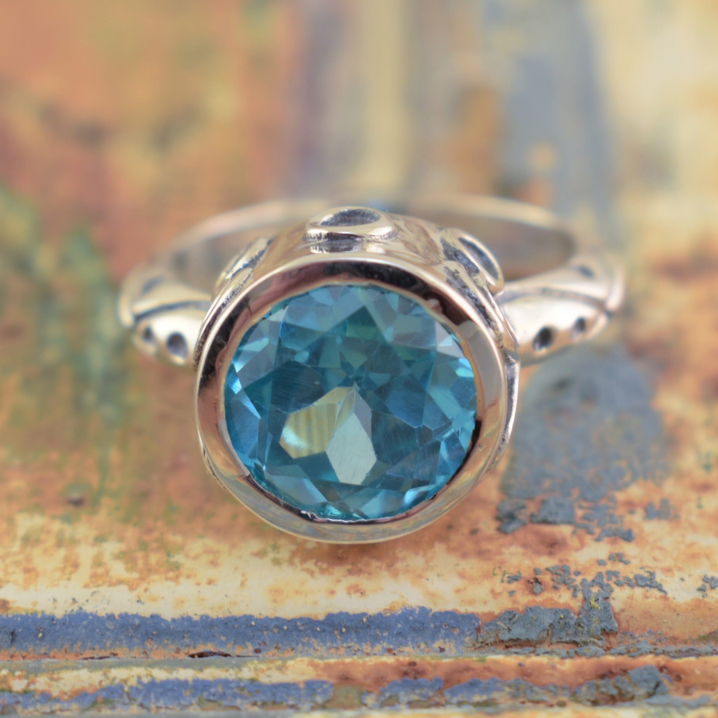 round cut sky blue topaz ring