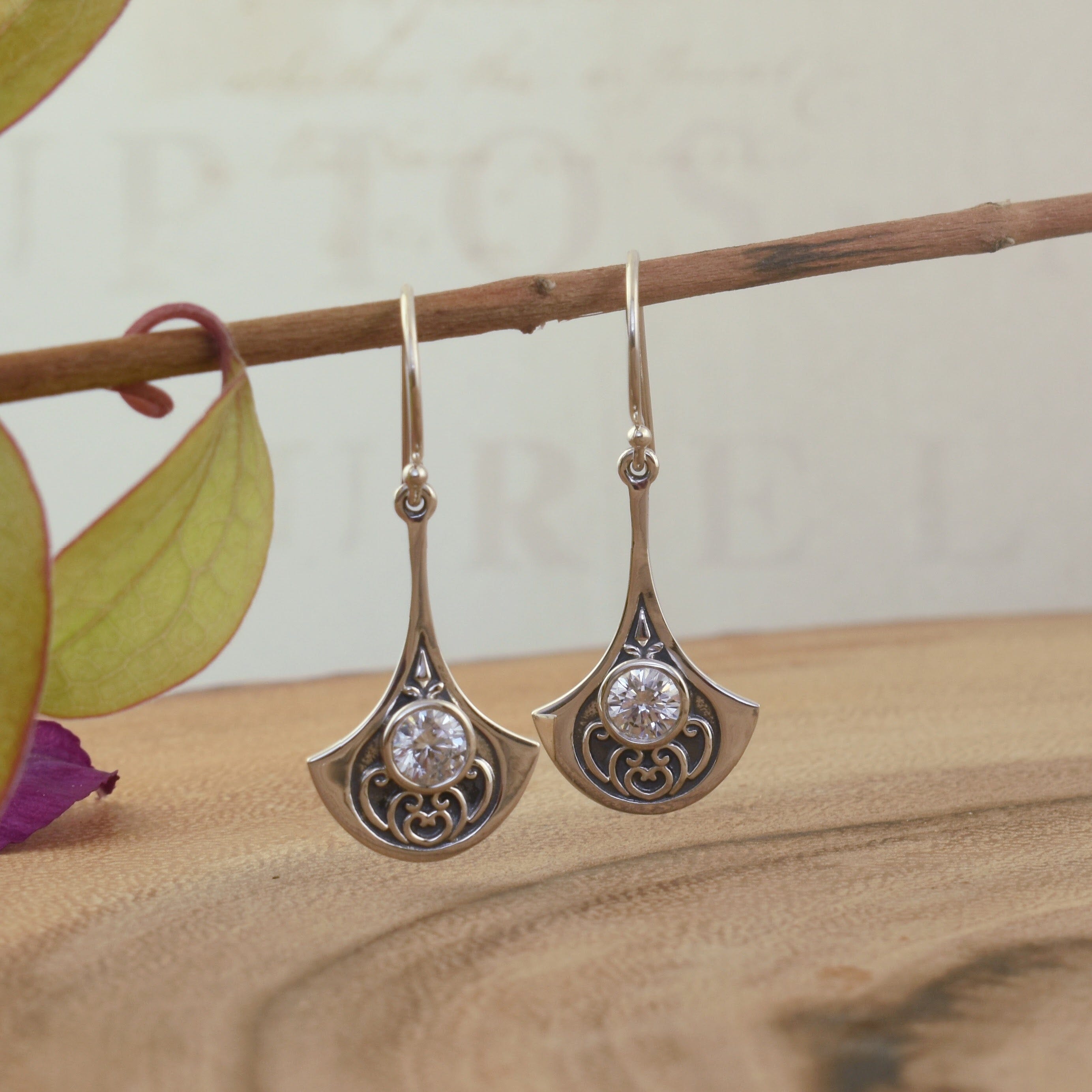 .925 sterling silver dangle earrings with bali design and sterling silver accent stones