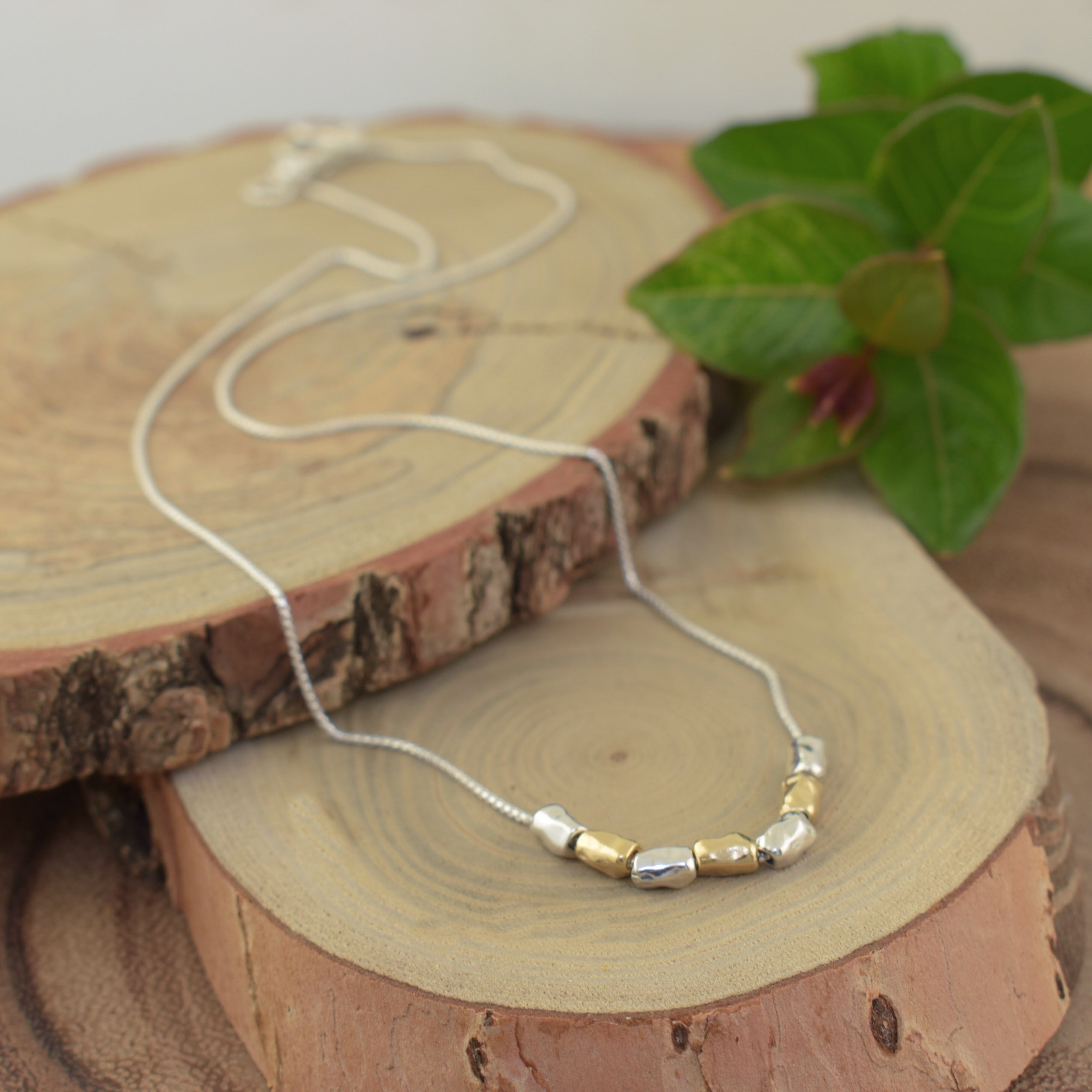 gold and silver organic beaded necklace