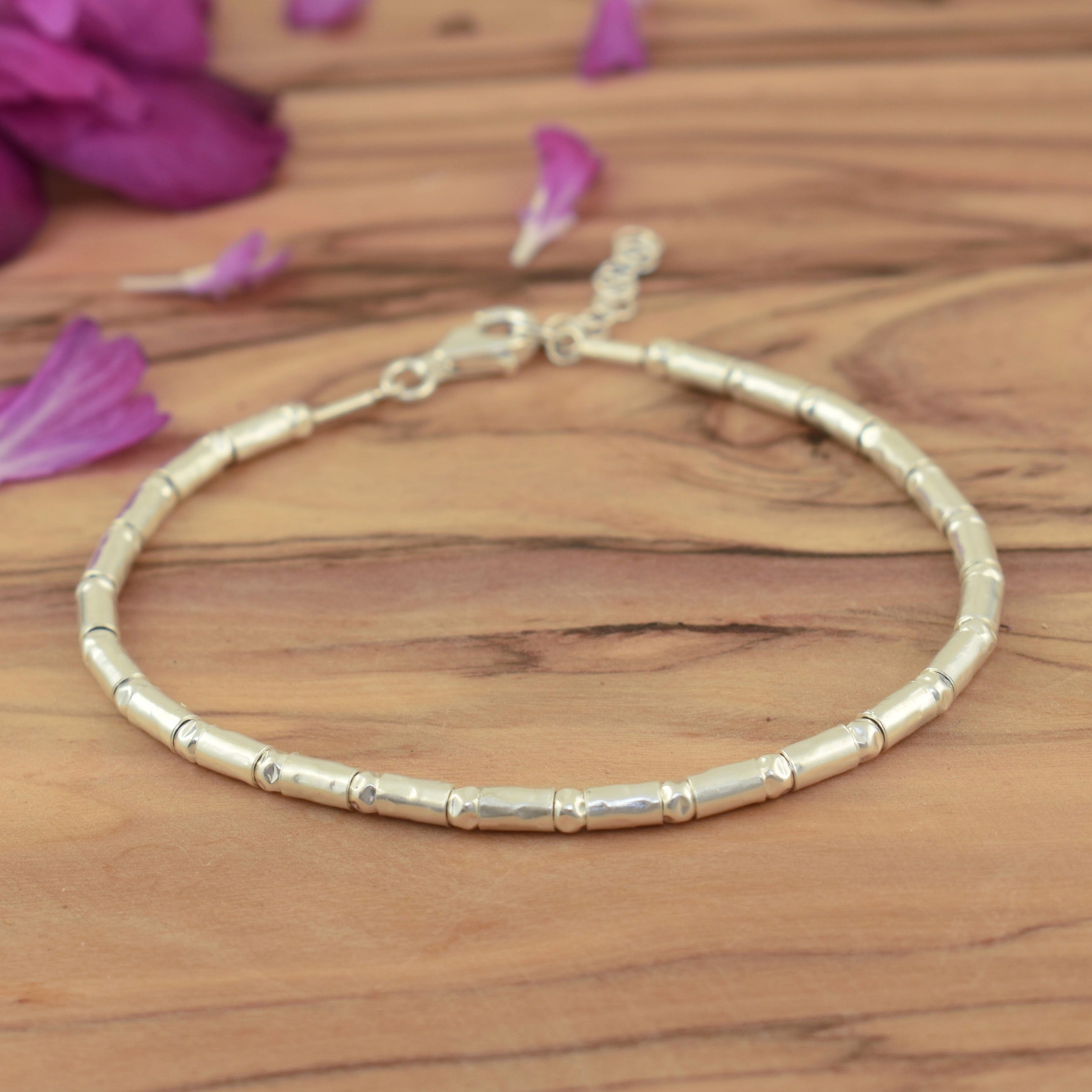 Adjustable sterling silver bracelet with barrel-like beads