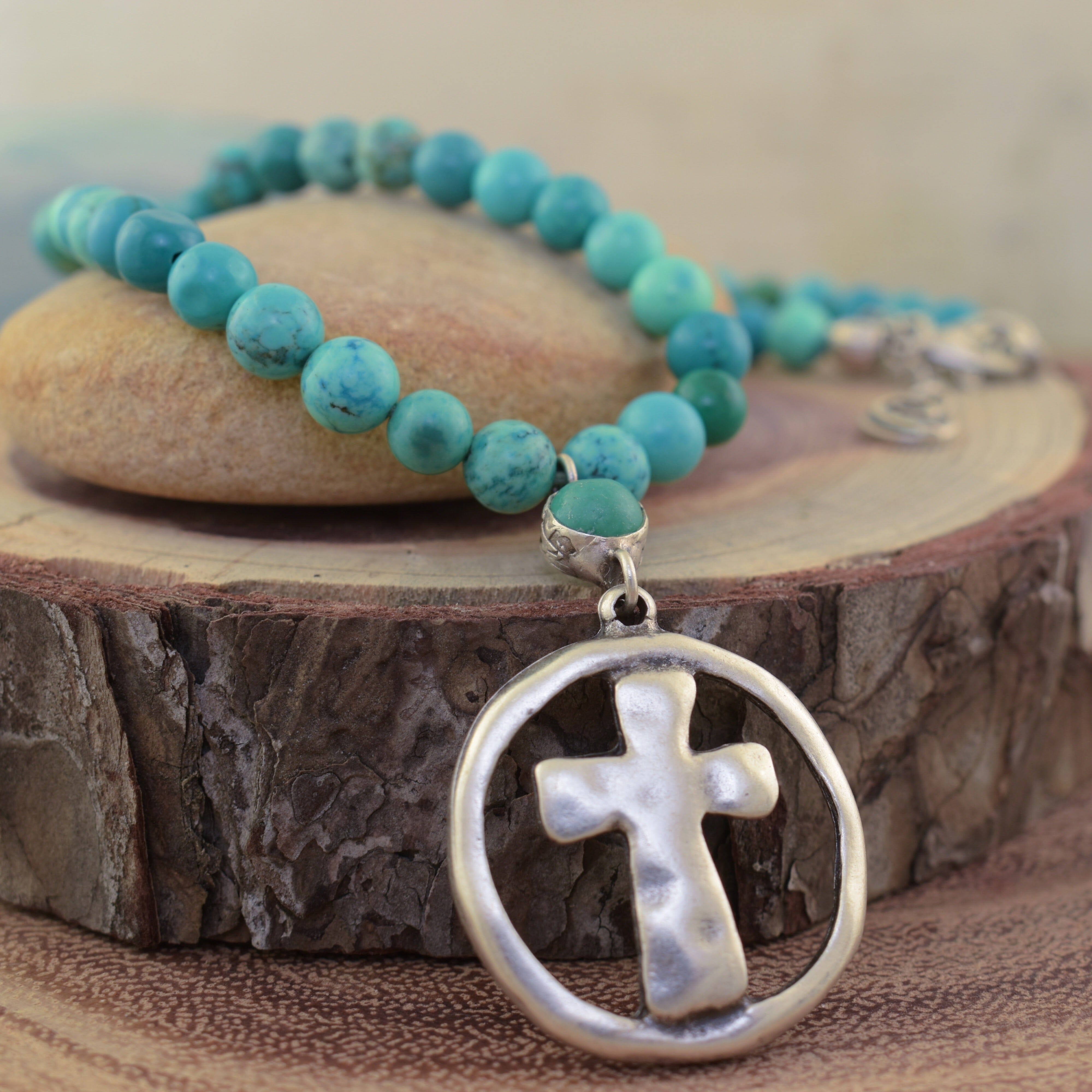 Reconstructed turquoise necklace with a cross pendant