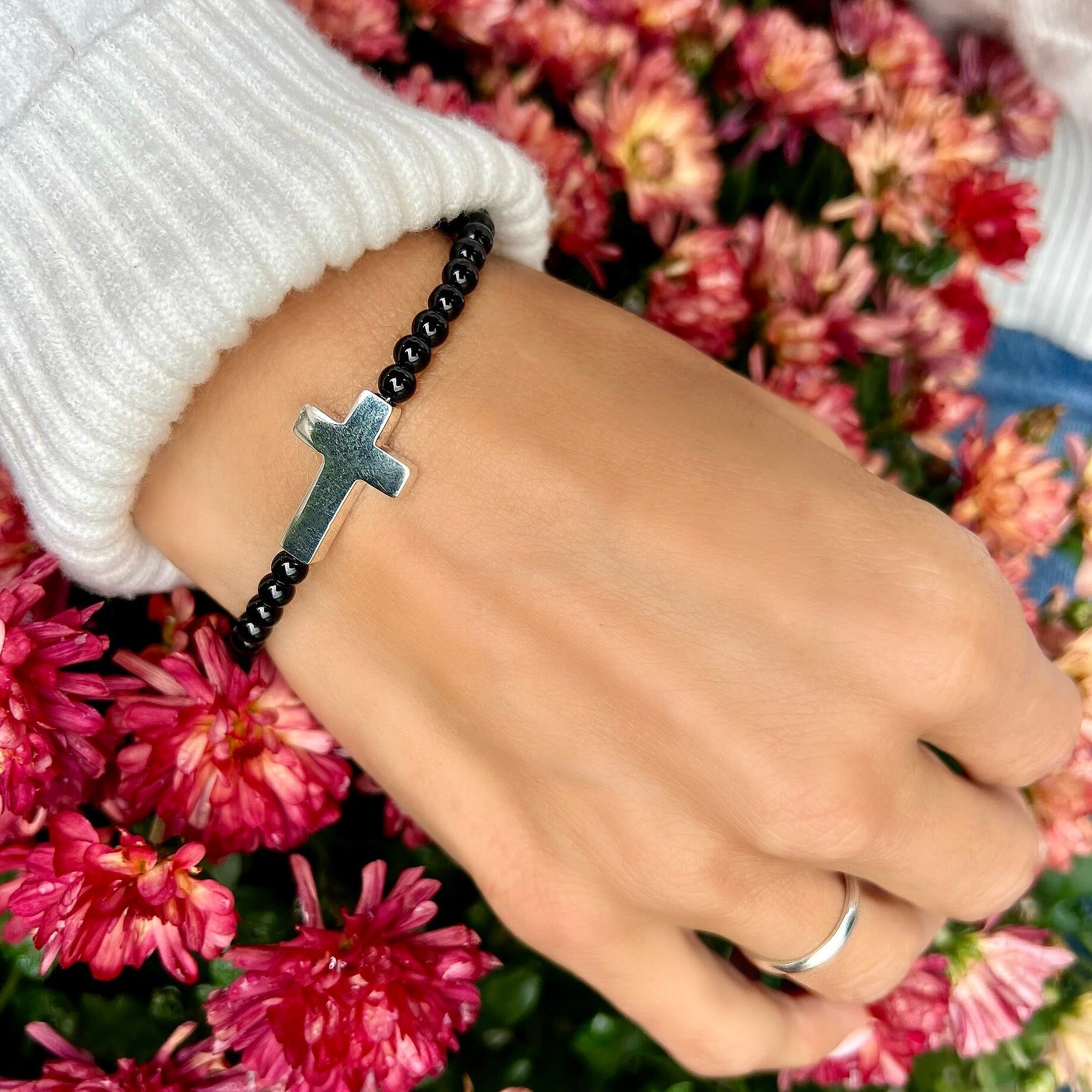 Designer bracelet with genuine onyx beads and .925 sterling silver cross