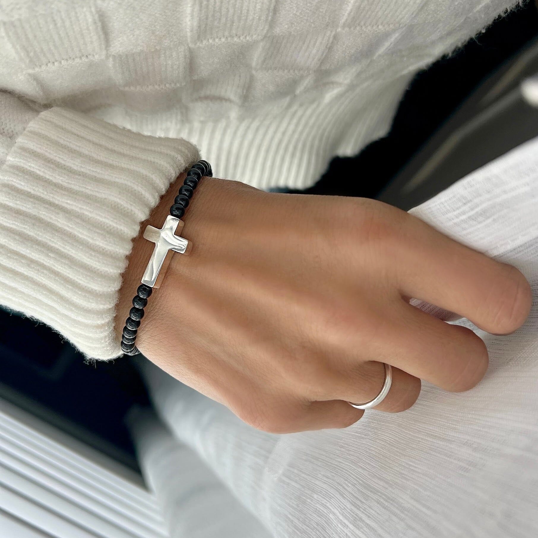 Sterling silver cross with black onyx beads