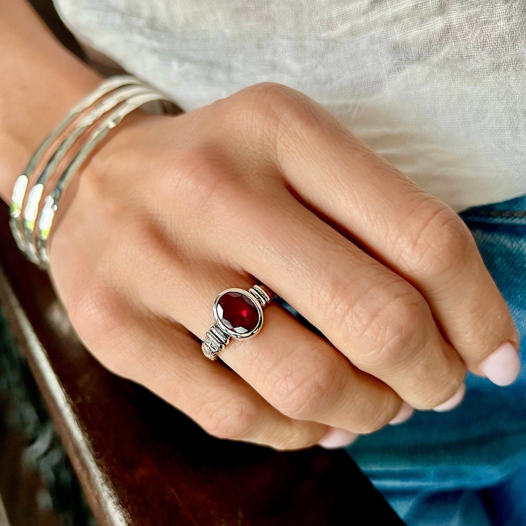 oval rubellite stone bezel set in handcrafted sterling silver