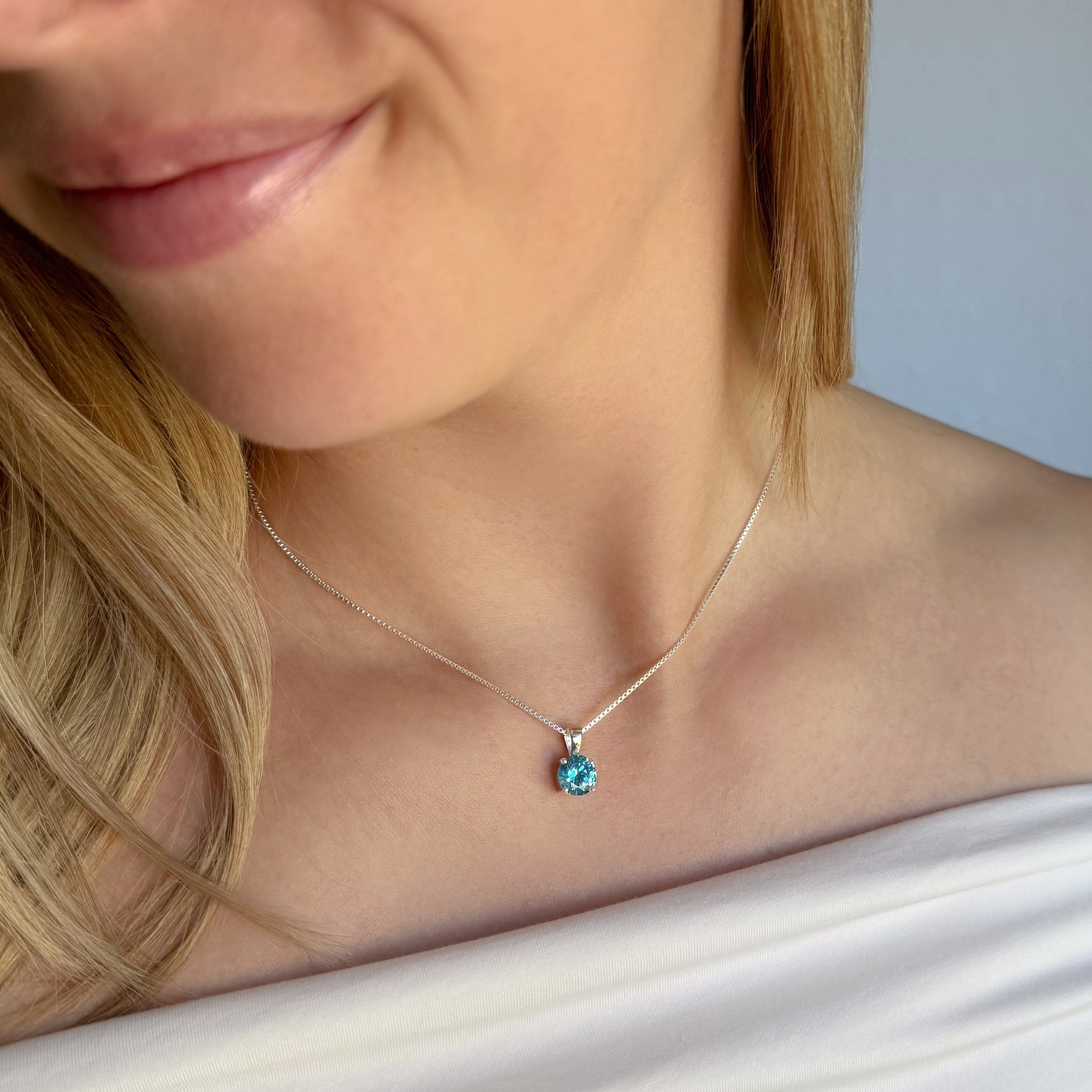 Aqua CZ stone pendant on a sterling silver chain