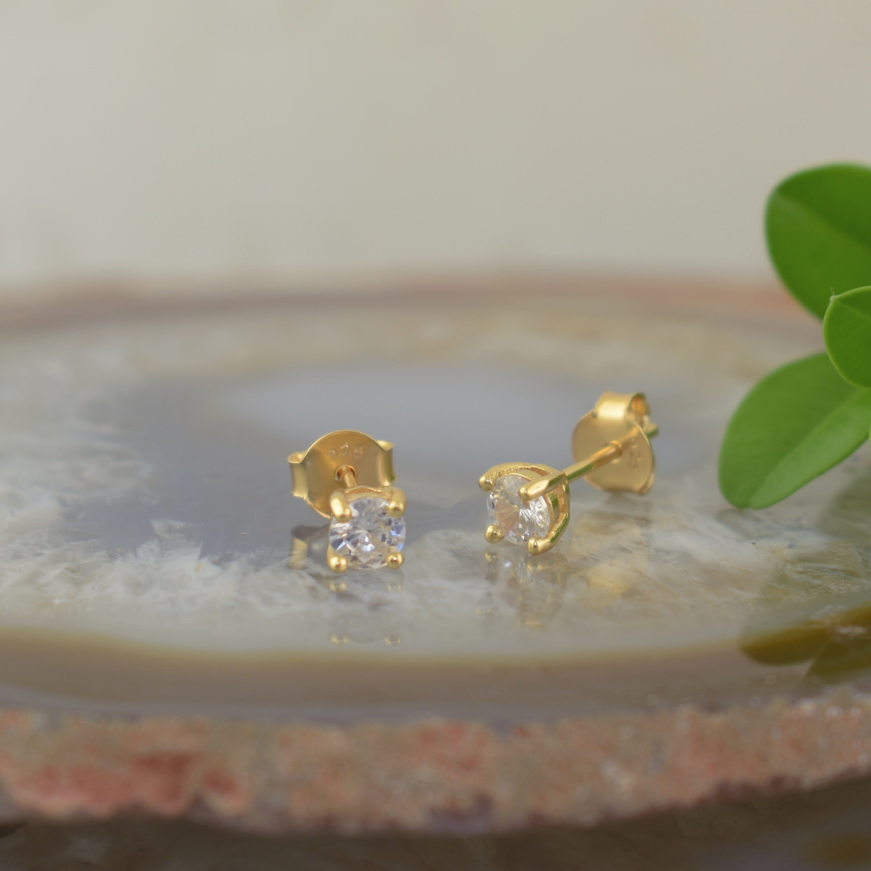 Sterling silver gold plated earrings with prong set CZ stones
