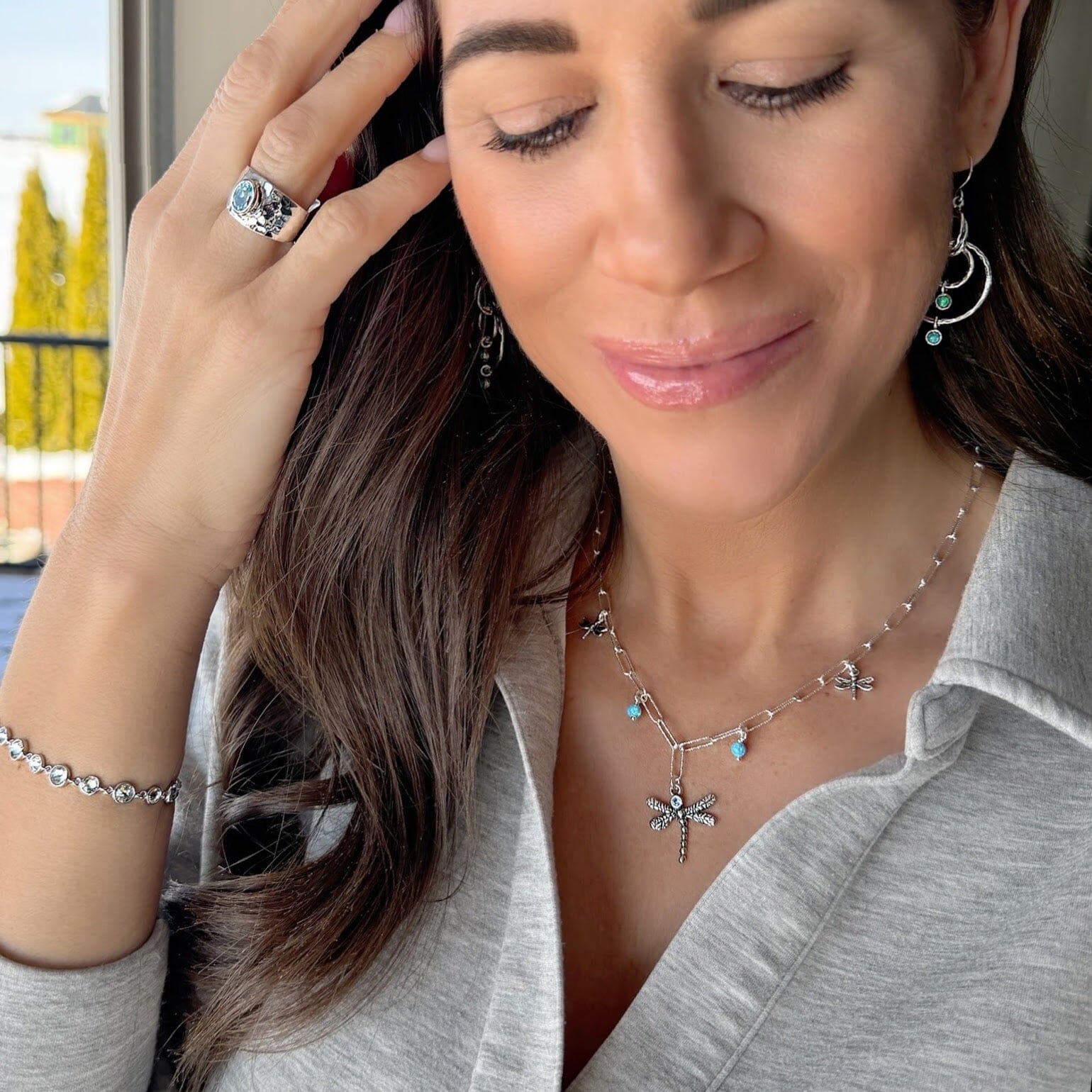 Bleu De Grace necklace paired with the opal two step earrings, right as rain ring and set to sparkle bracelet