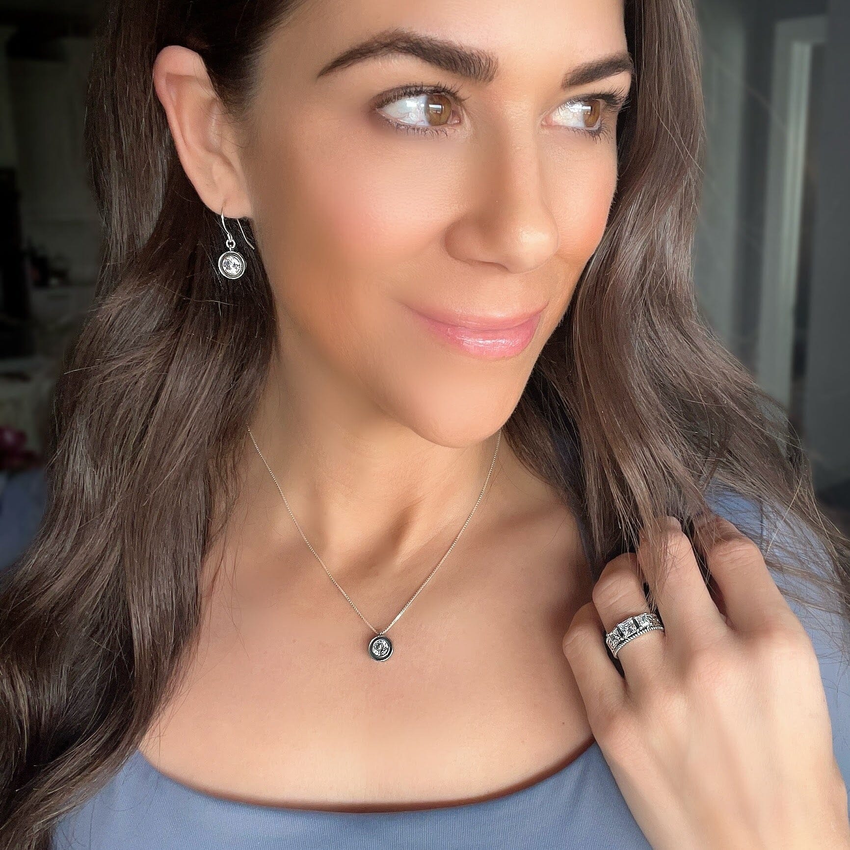 sterling silver handcrafted earrings featuring a cz stone paired with bling it necklace and my time ring