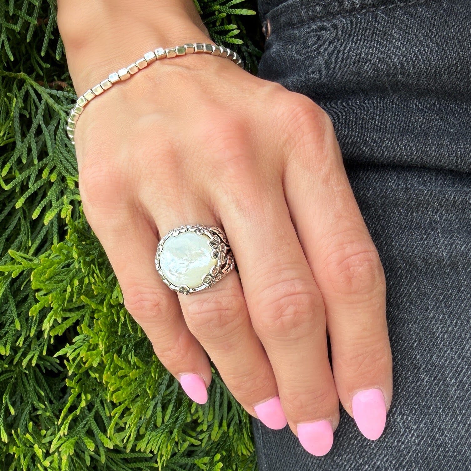 chunky silver designer ring featuring mother of pearl