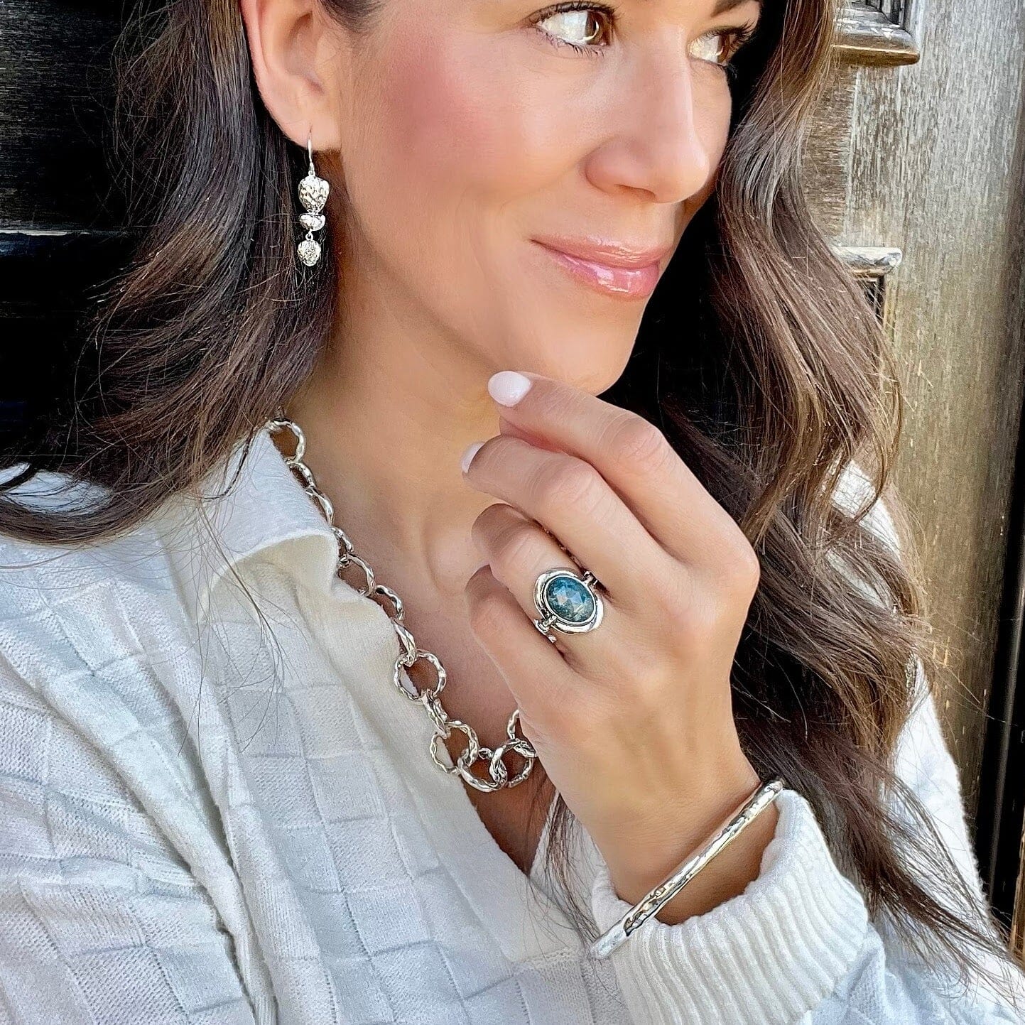 Blue Me Away Ring paired with Bedrock Earrings, Today's Girl Necklace, and Squared-Up Bangle