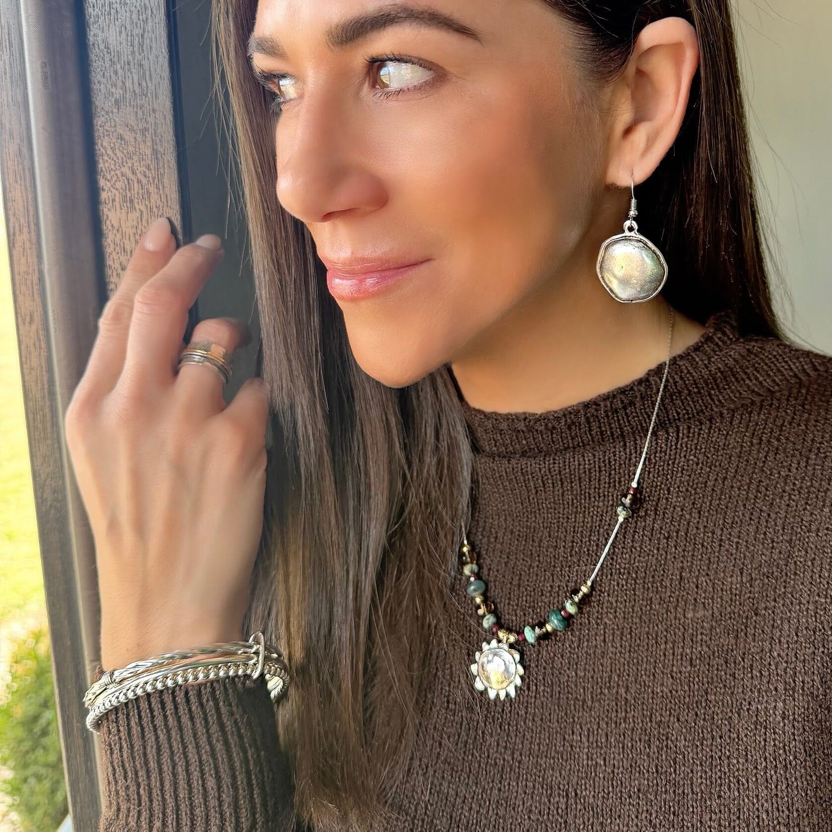 Bold Move Earrings paired with sterling silver jewelry