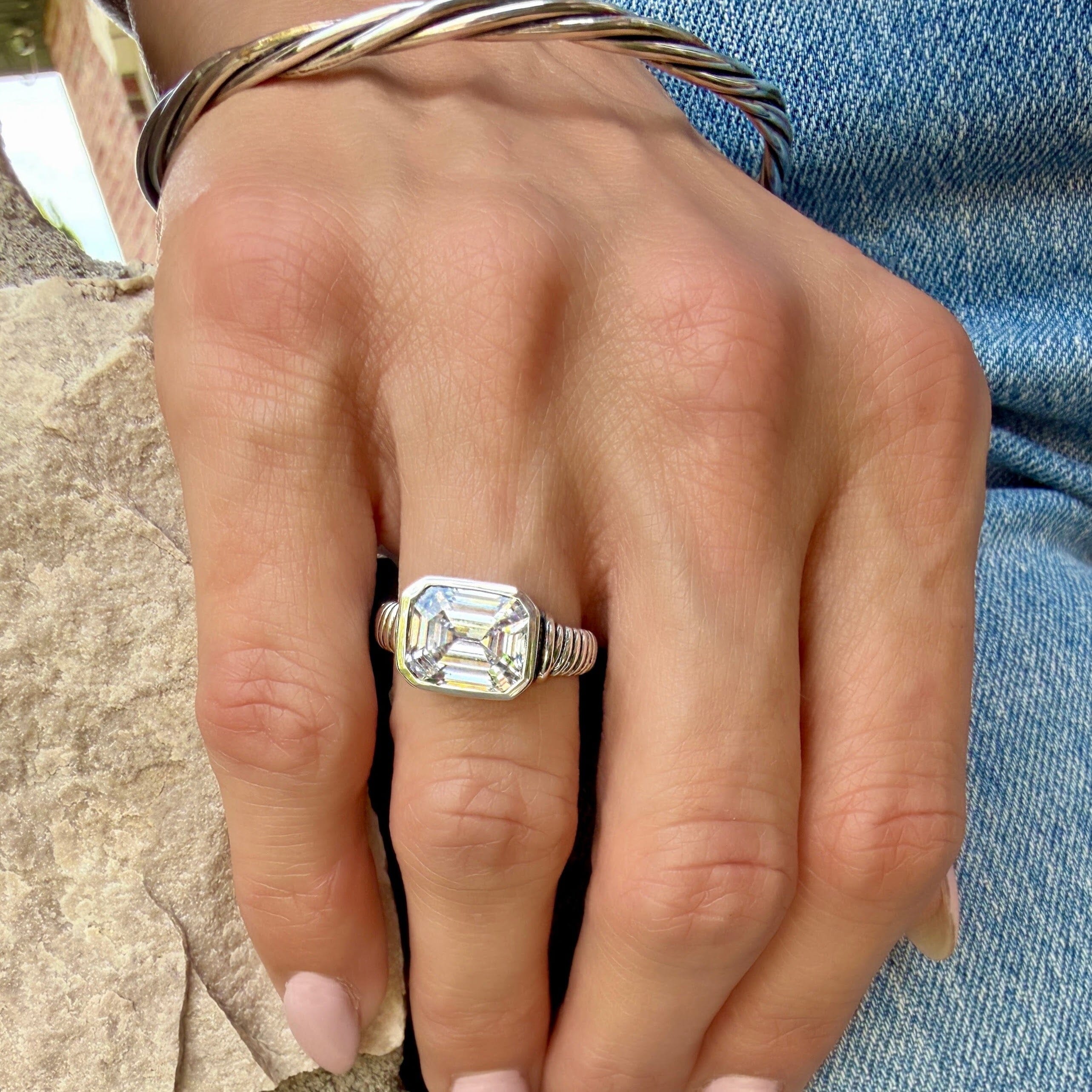 sterling silver statement ring featuring emerald cut cz