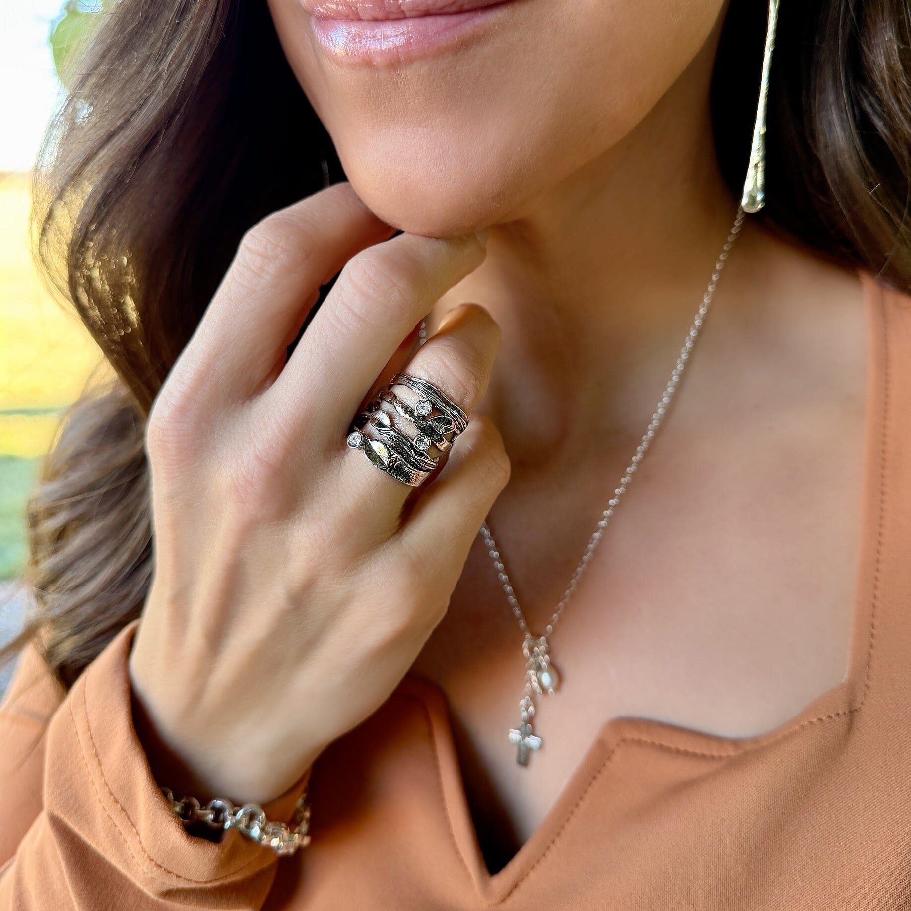 leaf designed ring featuring clear cz stones