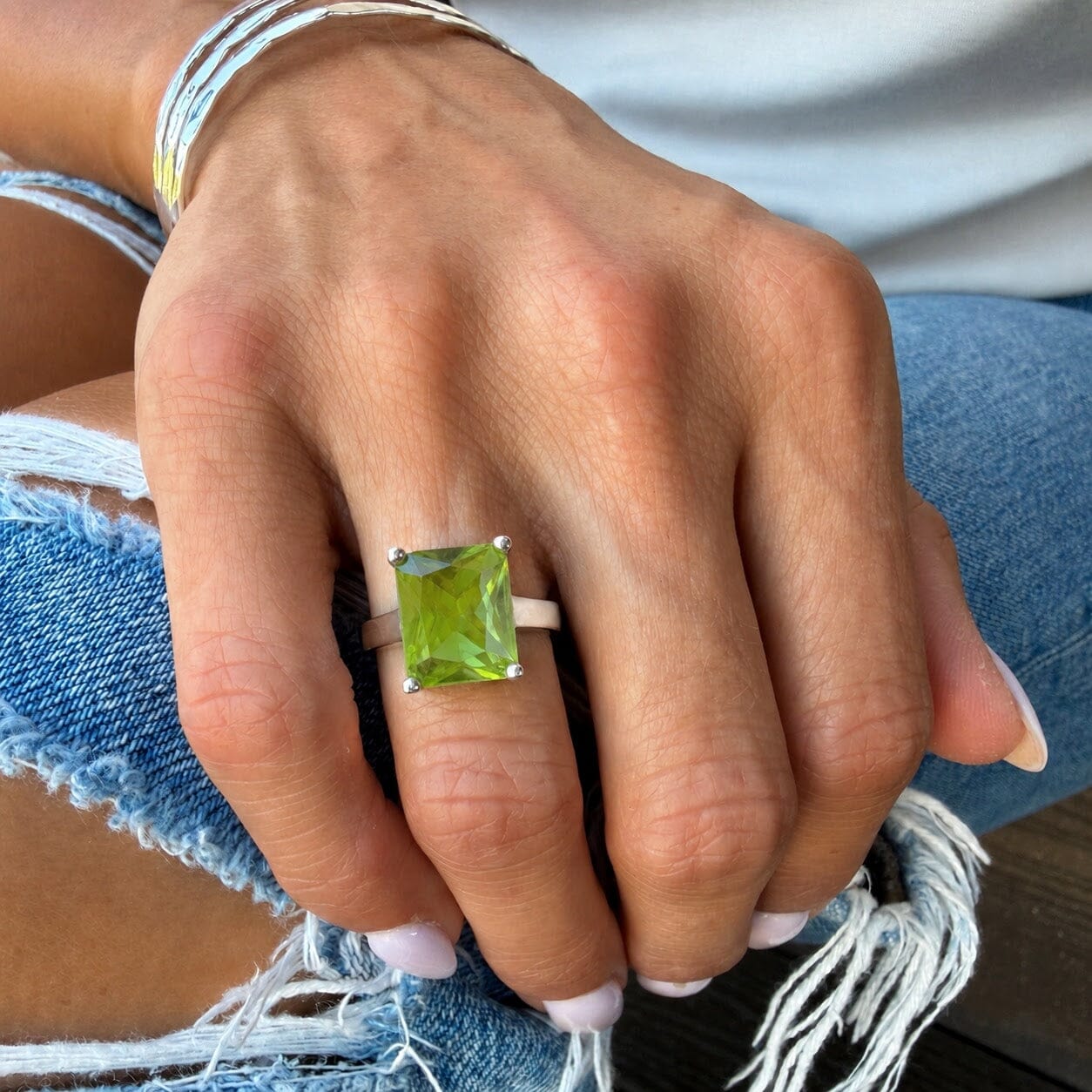 synthetic zultanite stone prong-set in minimalist band