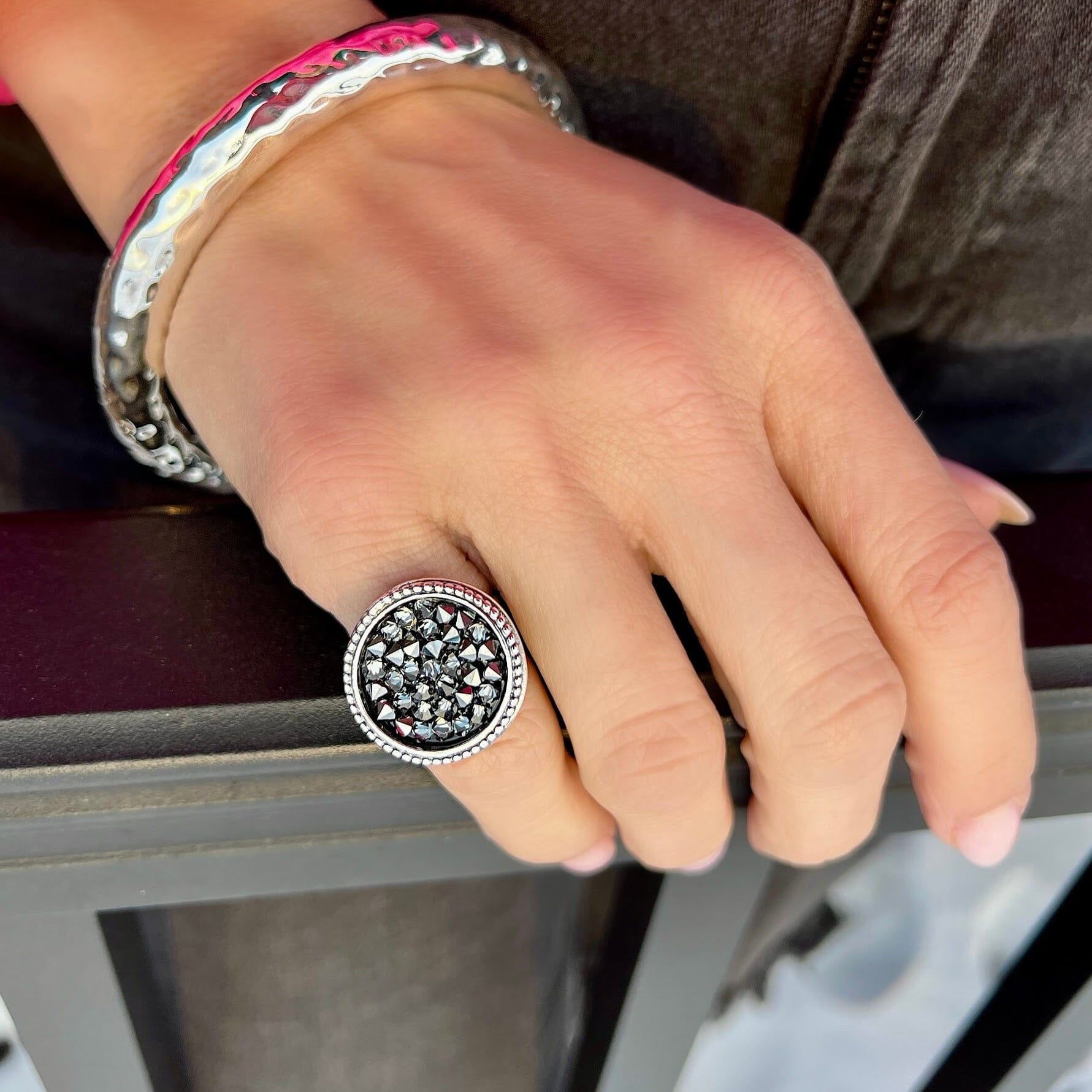 .925 silver ring with black Austrian crystals in the center with a beaded ring around