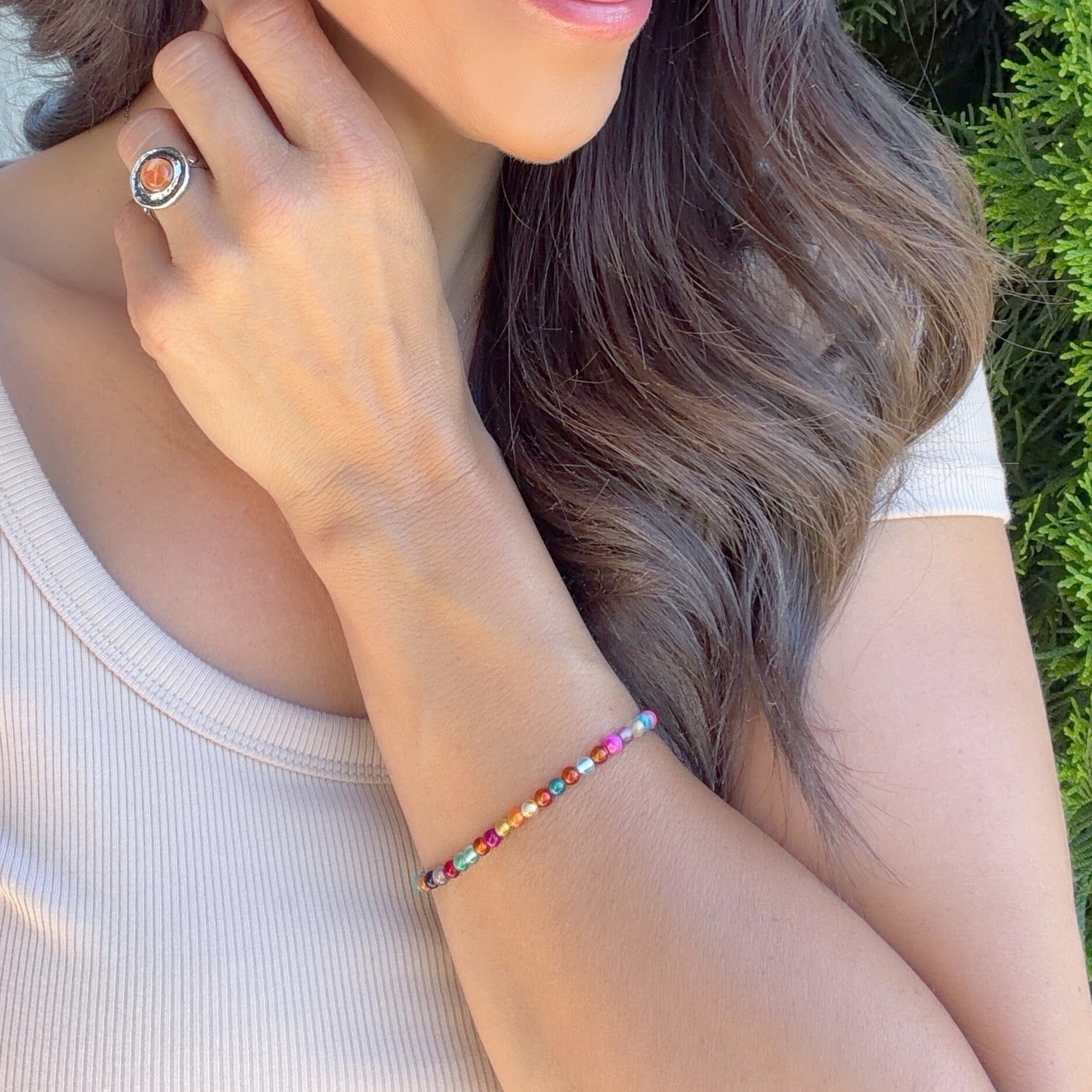 dainty bracelet with various colored beads