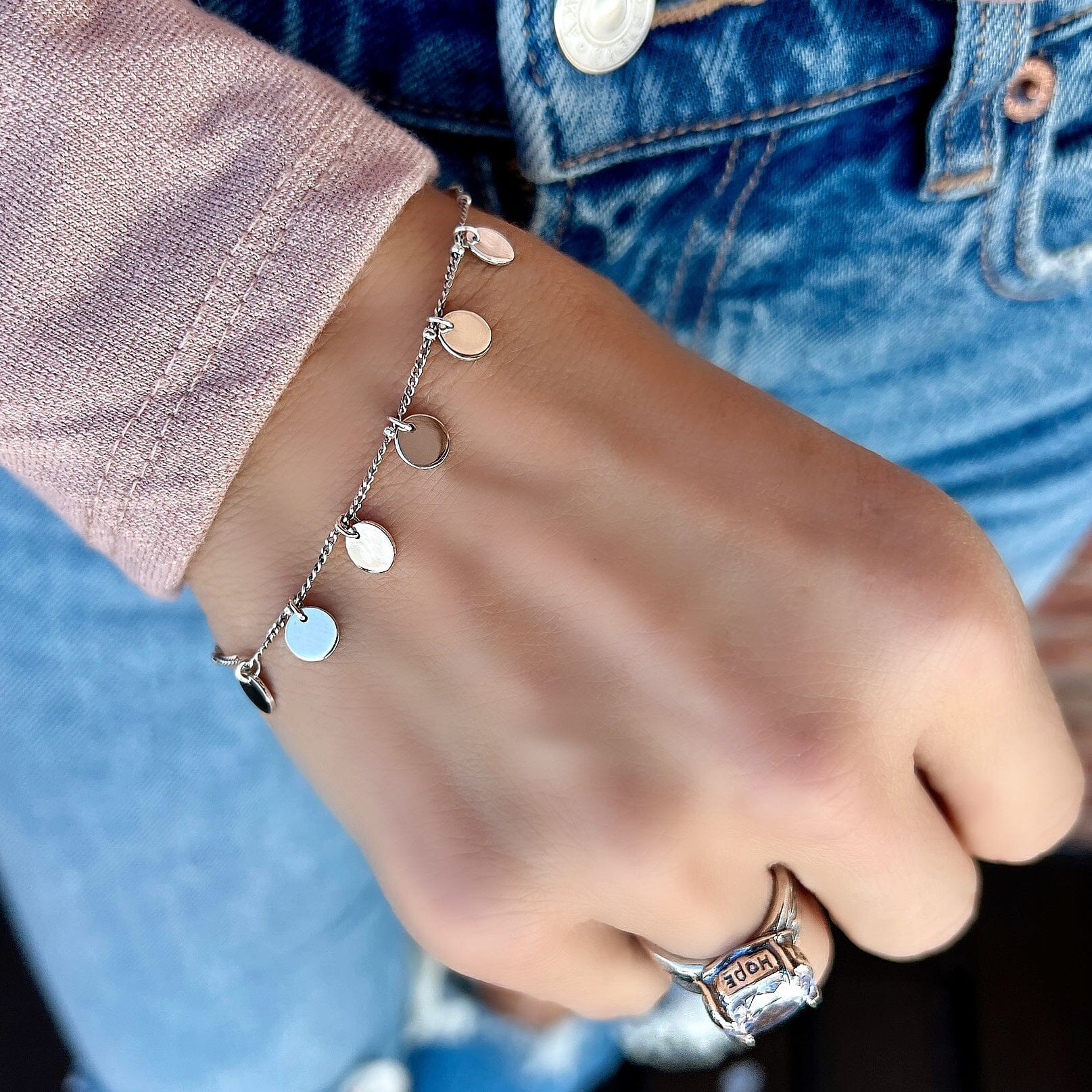 sterling silver bracelet  with silver discs paired with the enjoy ring