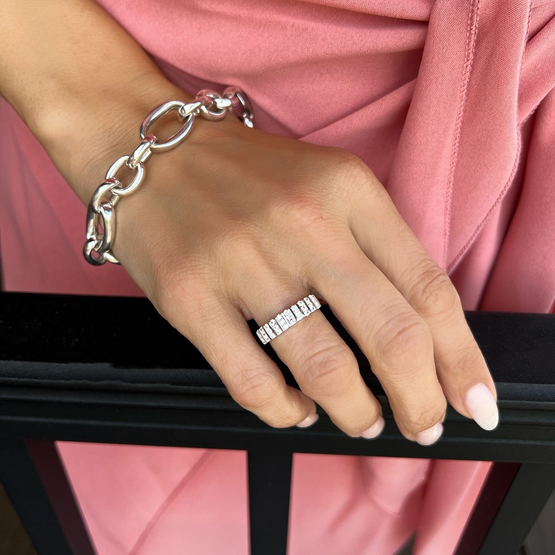 sterling silver statement band featuring several CZ stones on top