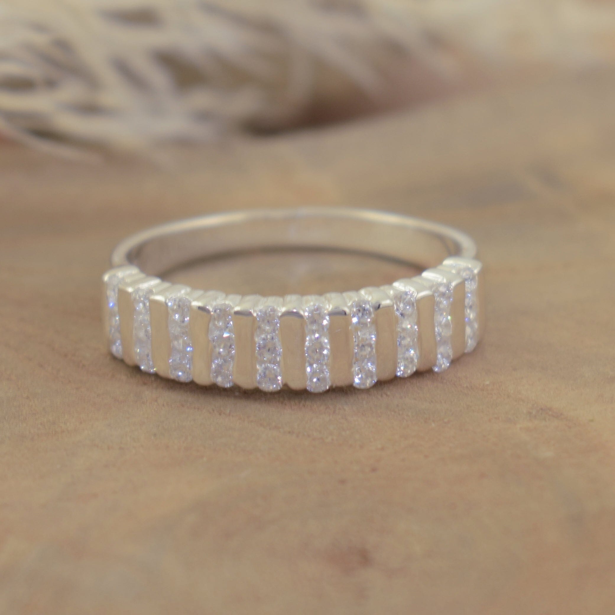 cz shimmery Channel Set Ring in sterling silver