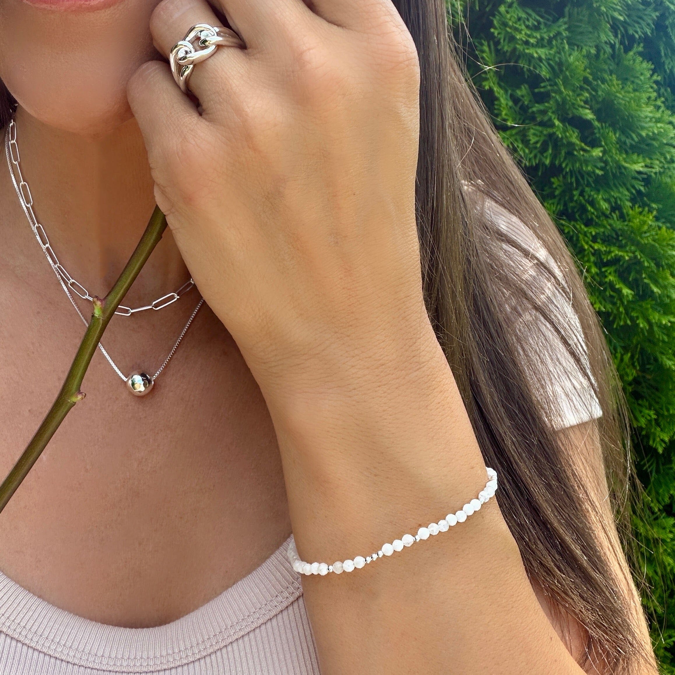 thin white beaded bracelet