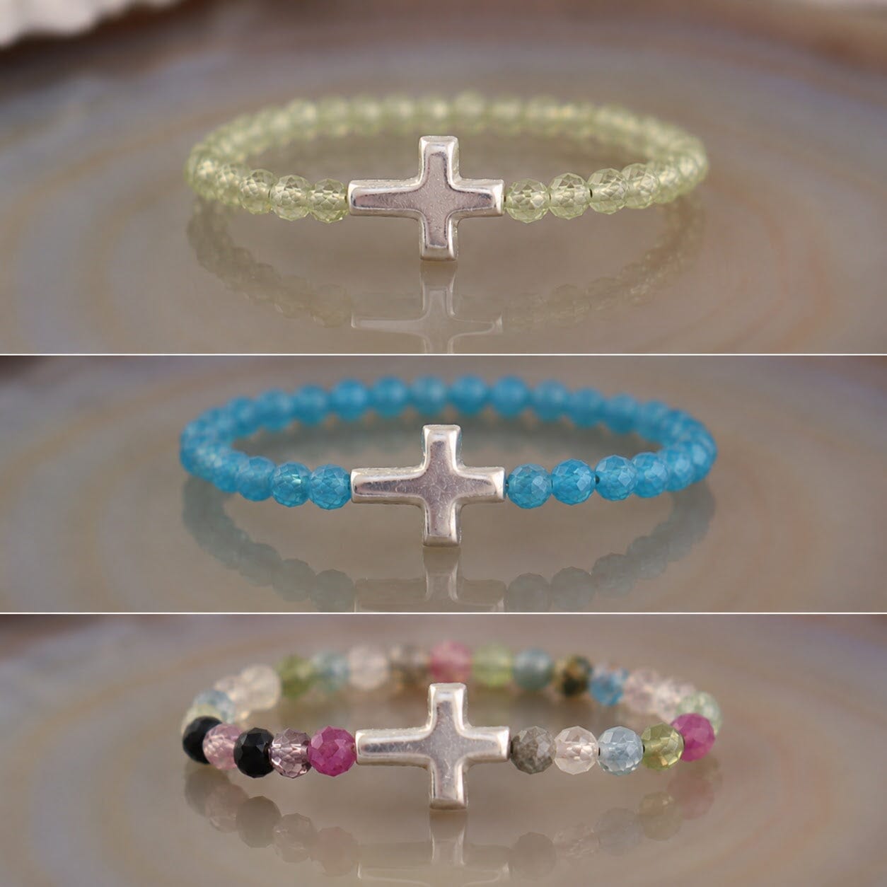peridot, apatite, and tourmaline stretch cross rings