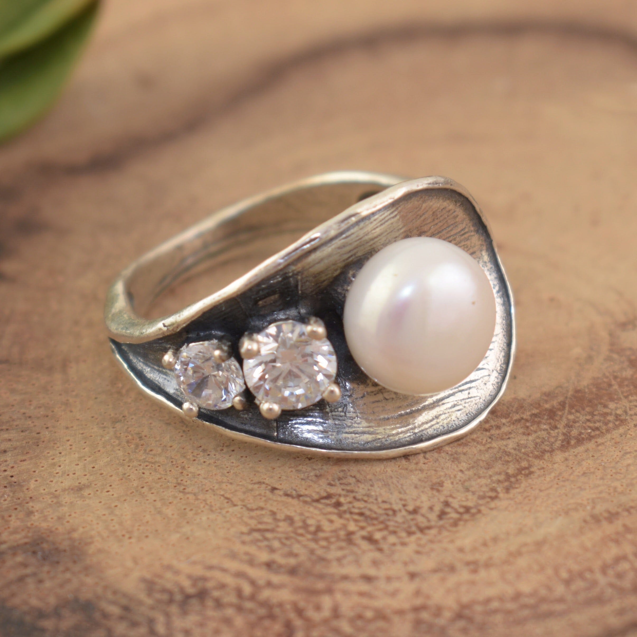 Freshwater pearl ring with prong set cz stones