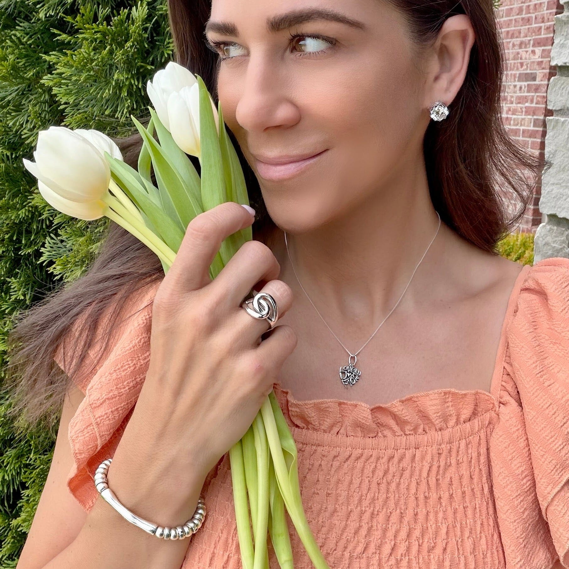 Coastal Current Bracelet paired with sterling silver jewelry