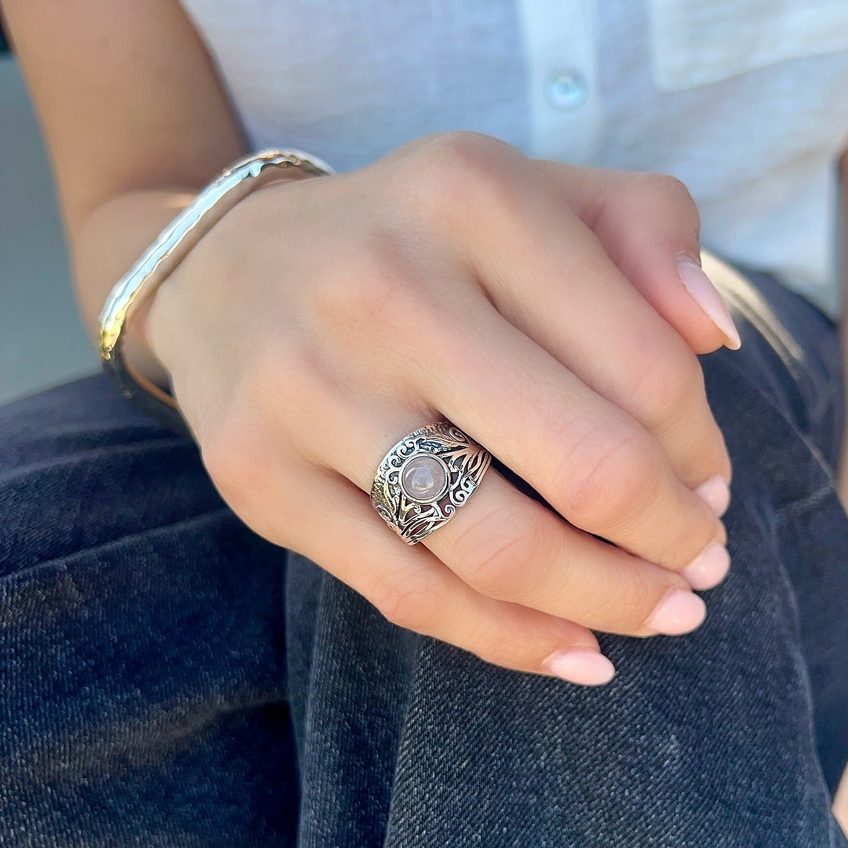 sterling silver cut our ring with a rose quarts stone in the center