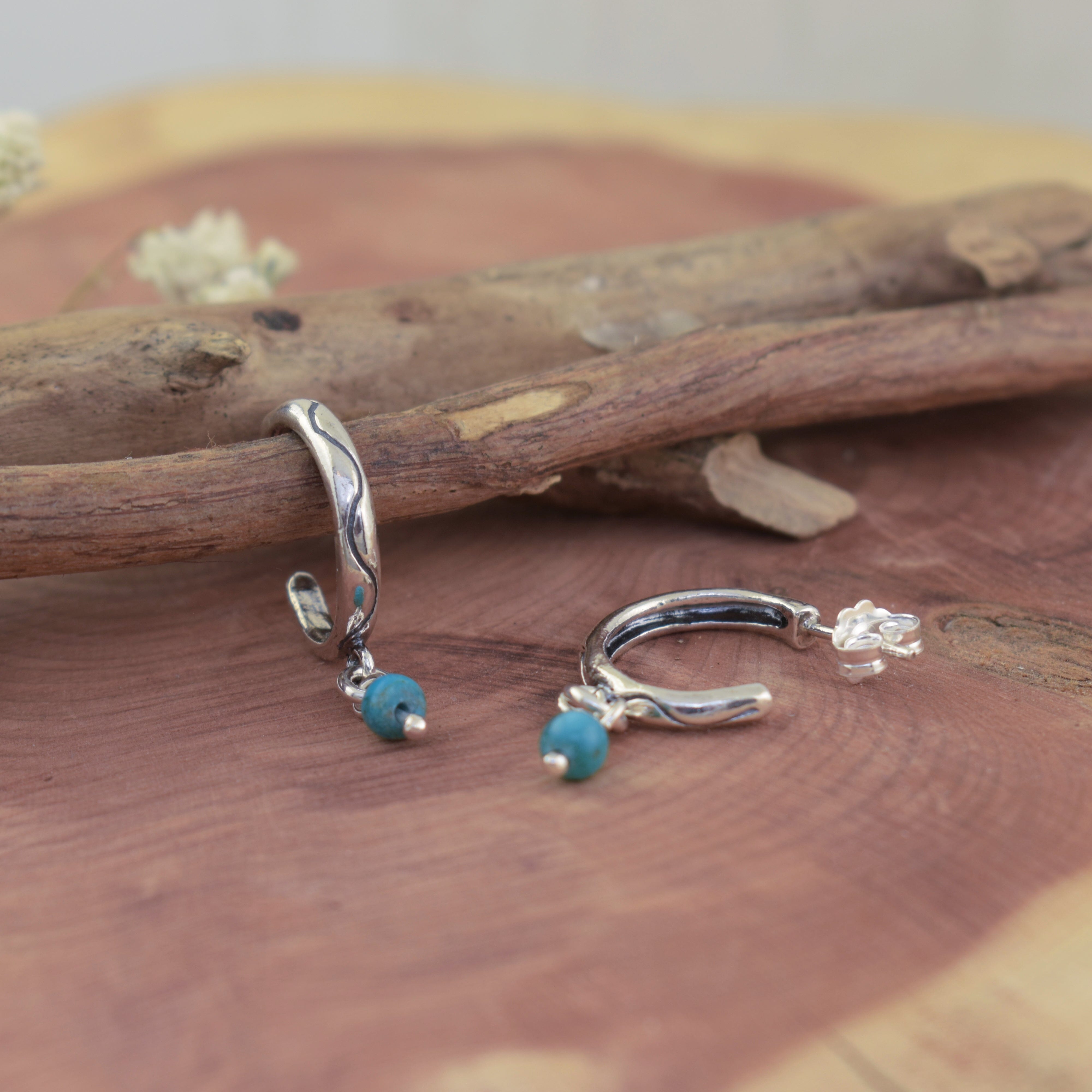 rustic style hoops with a curvy line and turquoise bead