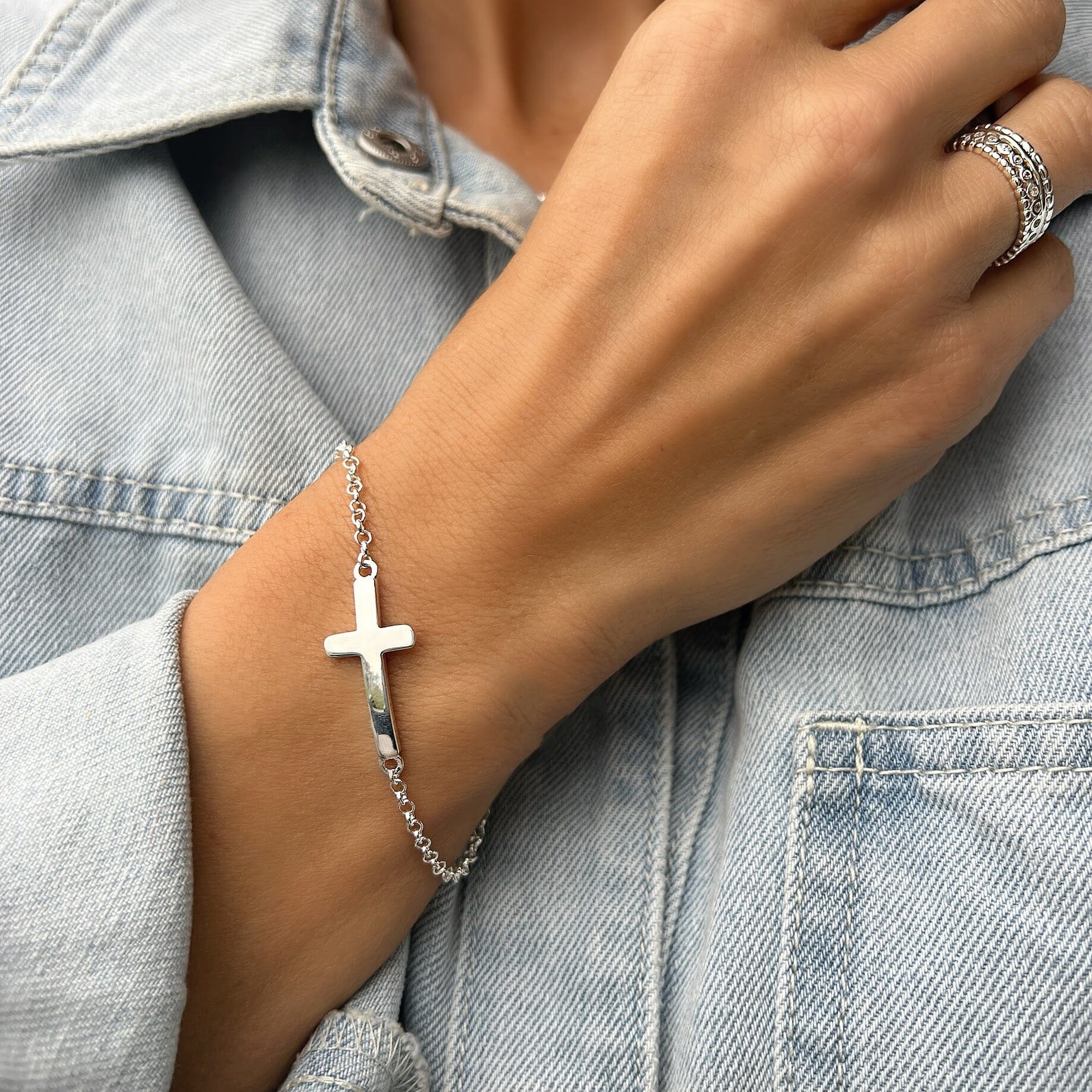 minimalist style Christian cross bracelet in sterling silver