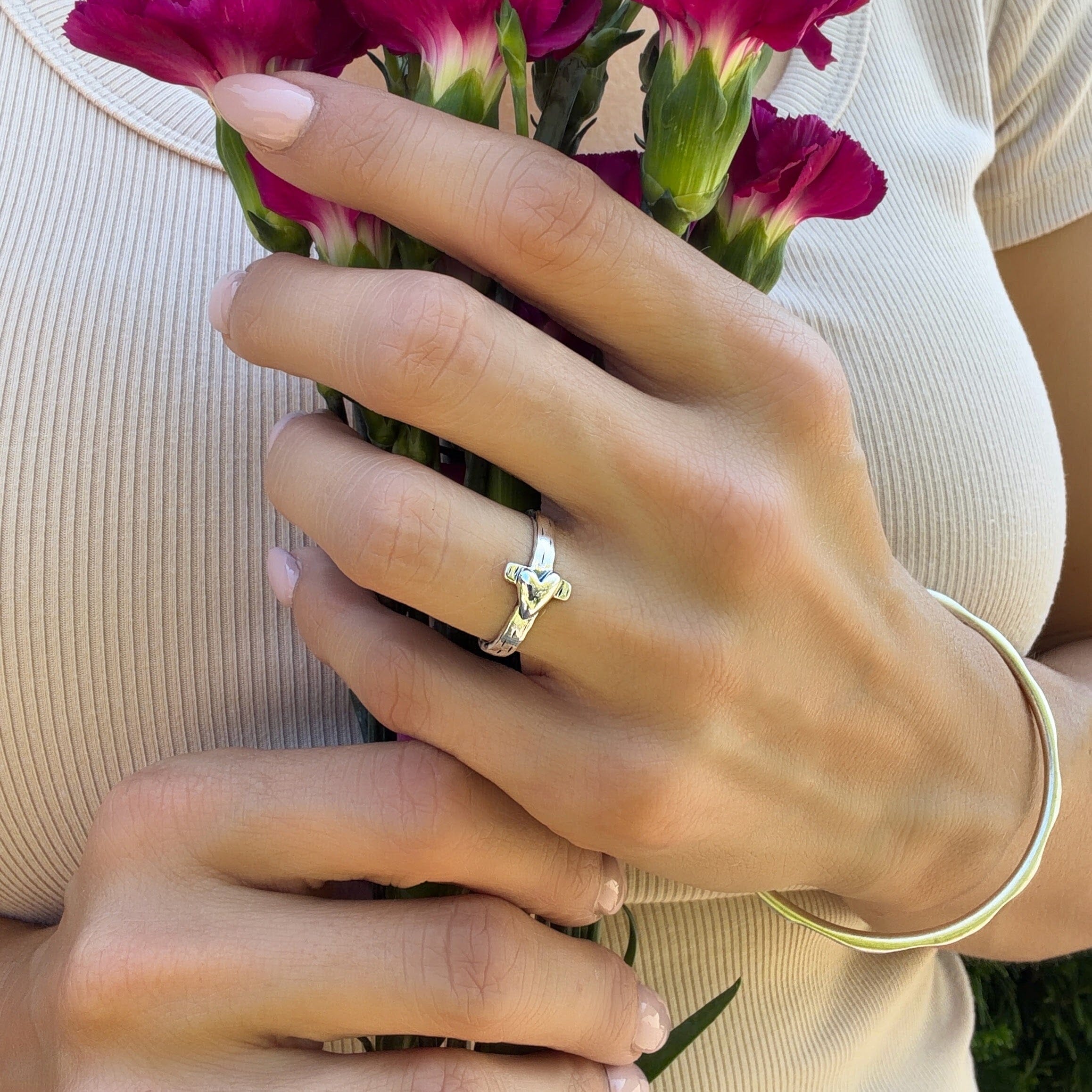 sterling silver cross ring with a heart center