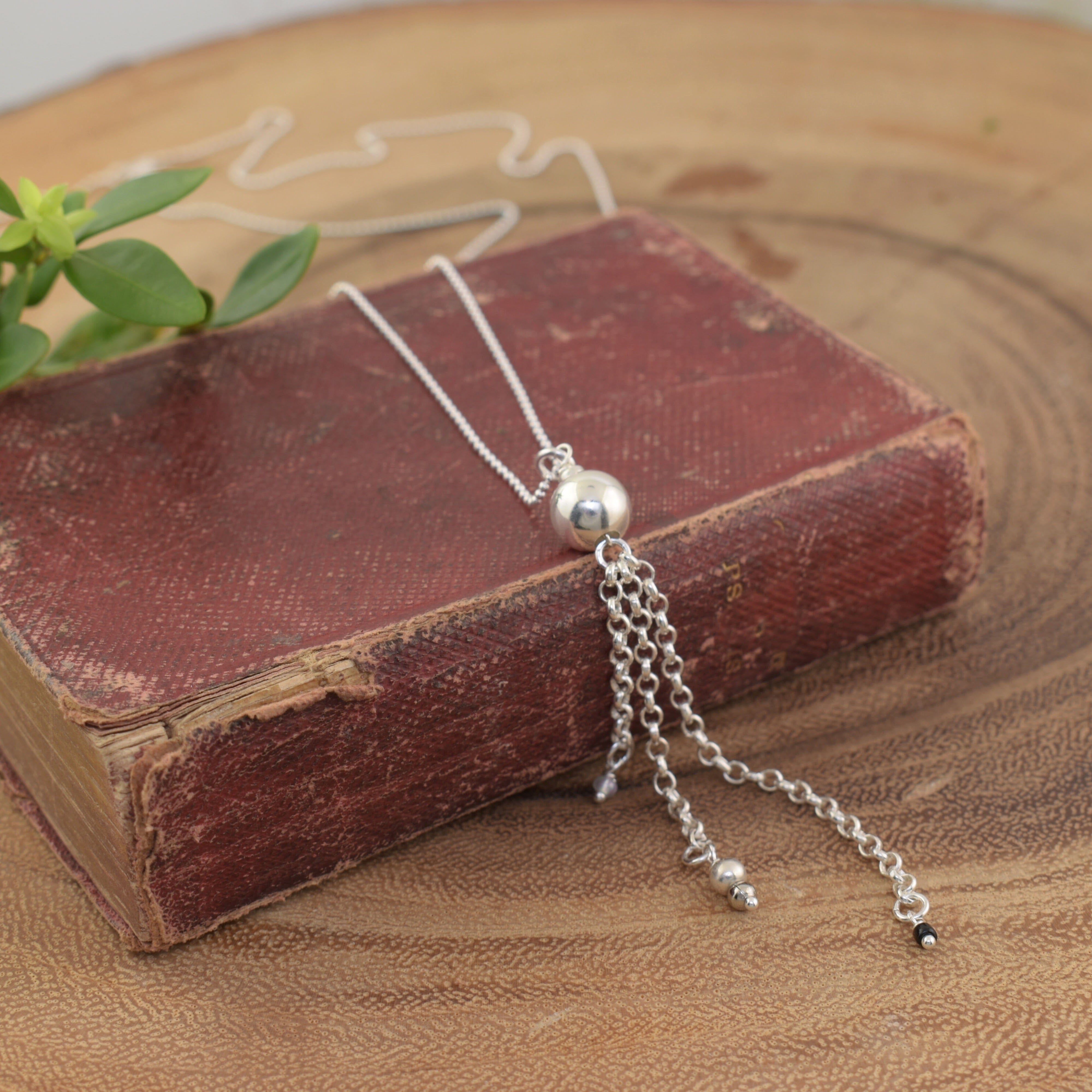 Sterling silver necklace with dangle pendant