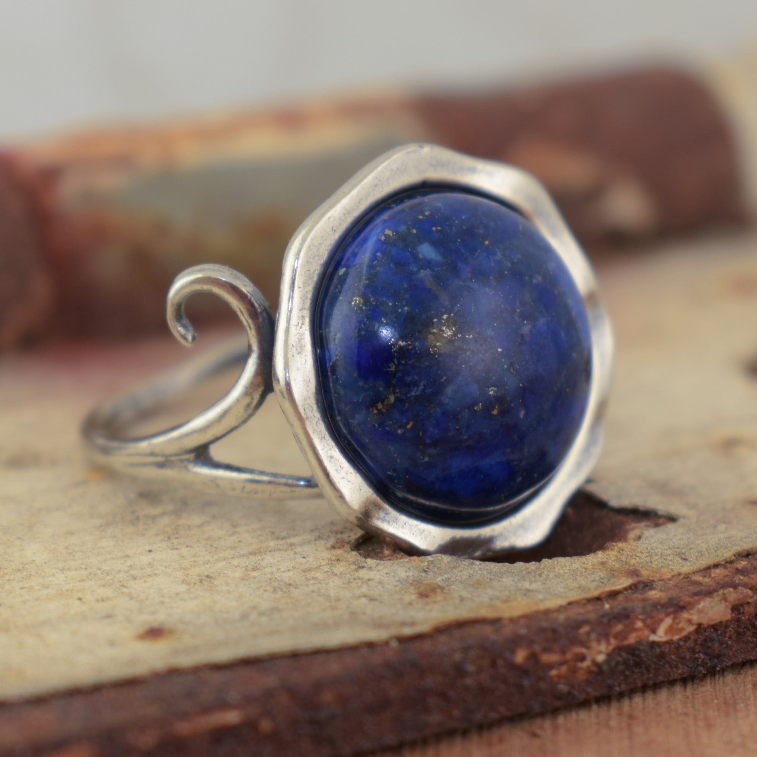 Sterling silver hand crafted ring with swirls on the band