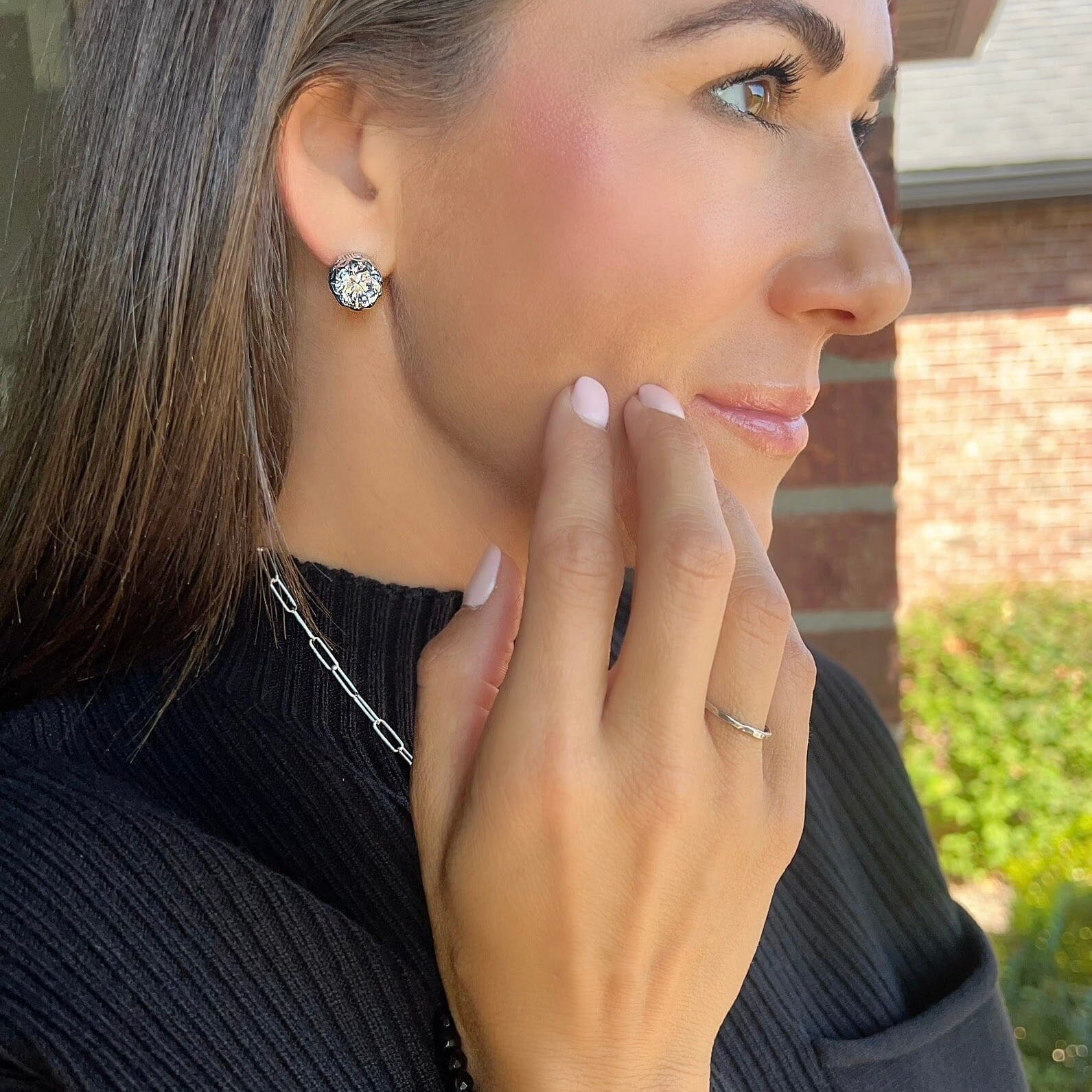 stud earrings featuring brilliant cubic zirconia prong-set in sterling silver