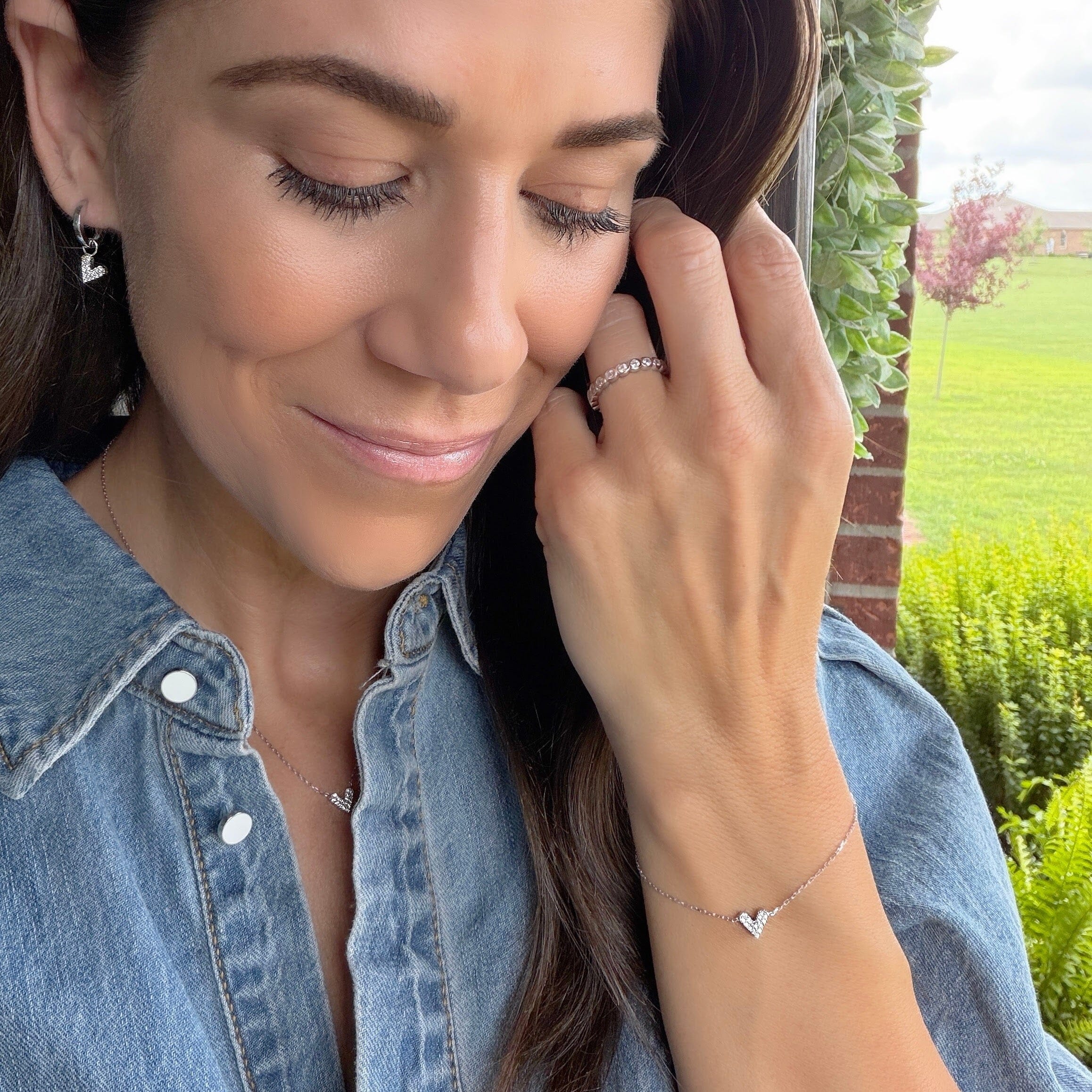 matching Double Take bracelet and necklace featuring a cz-paved heart pendant