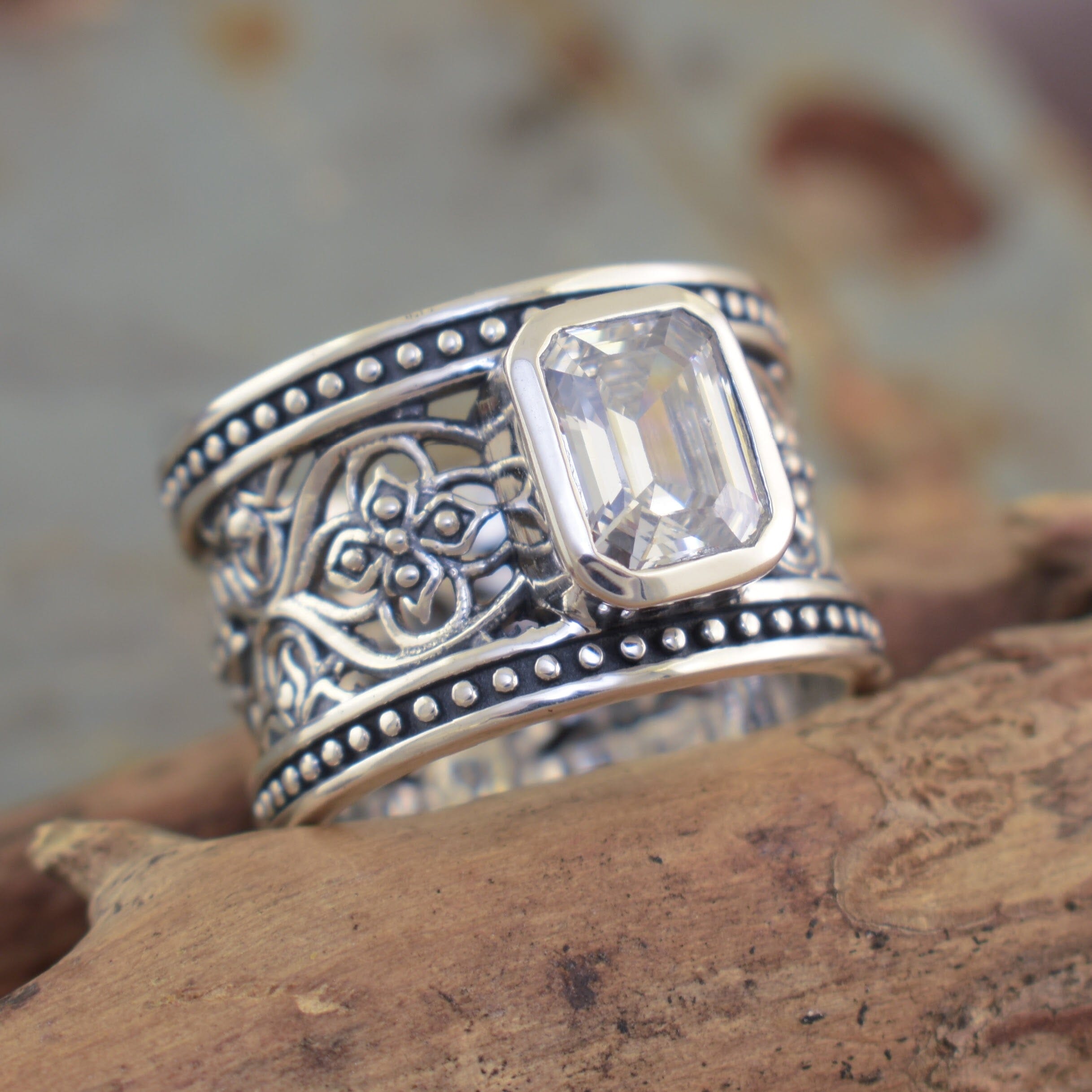 Designer ring with a rectangle clear cz