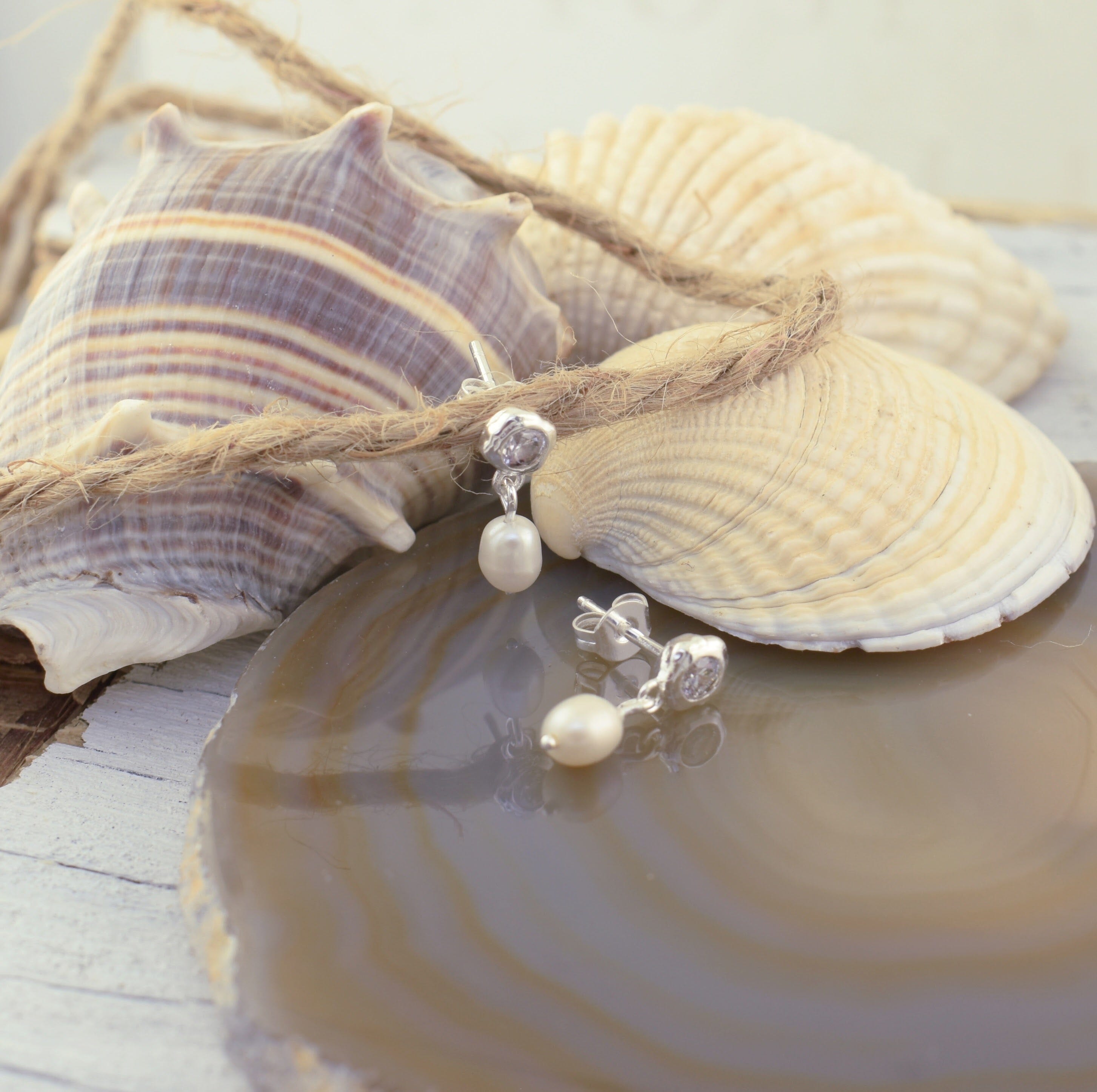 Silver dangle earrings with white pearl beads and clear crystal studs