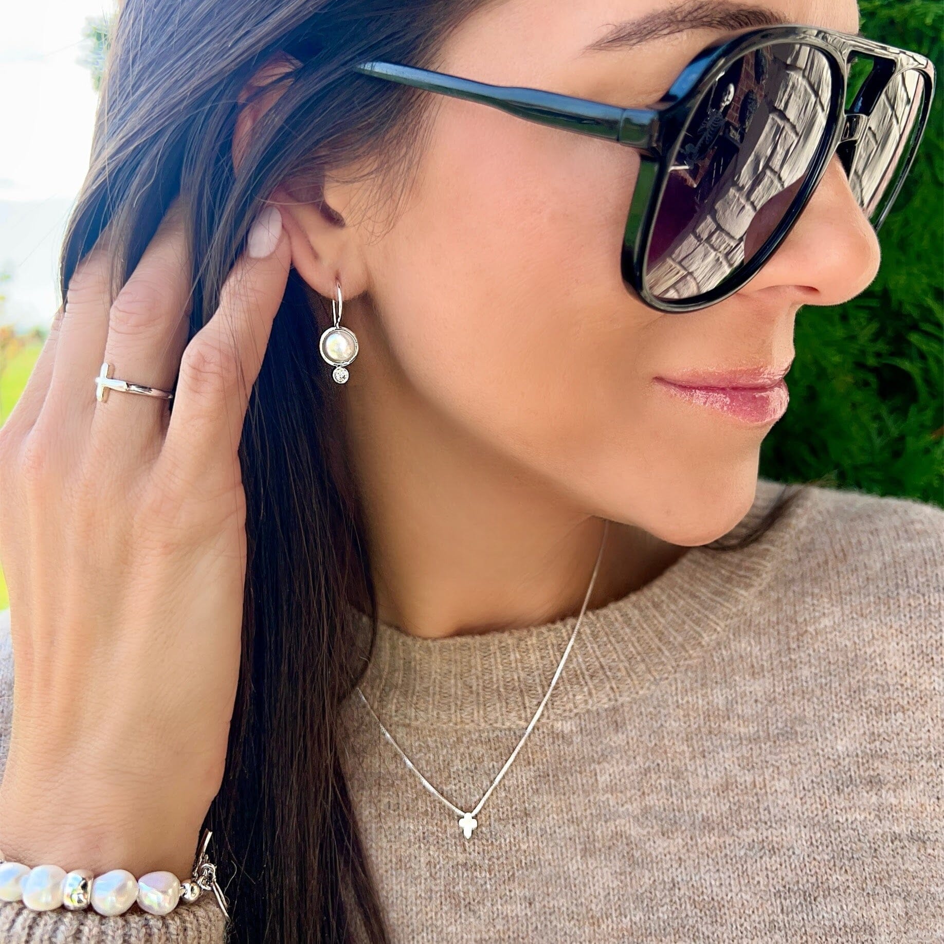Drop the Hint Earrings paired with Faithful Ring, Itty Bitty Cross Necklace, and Pearl Bracelet