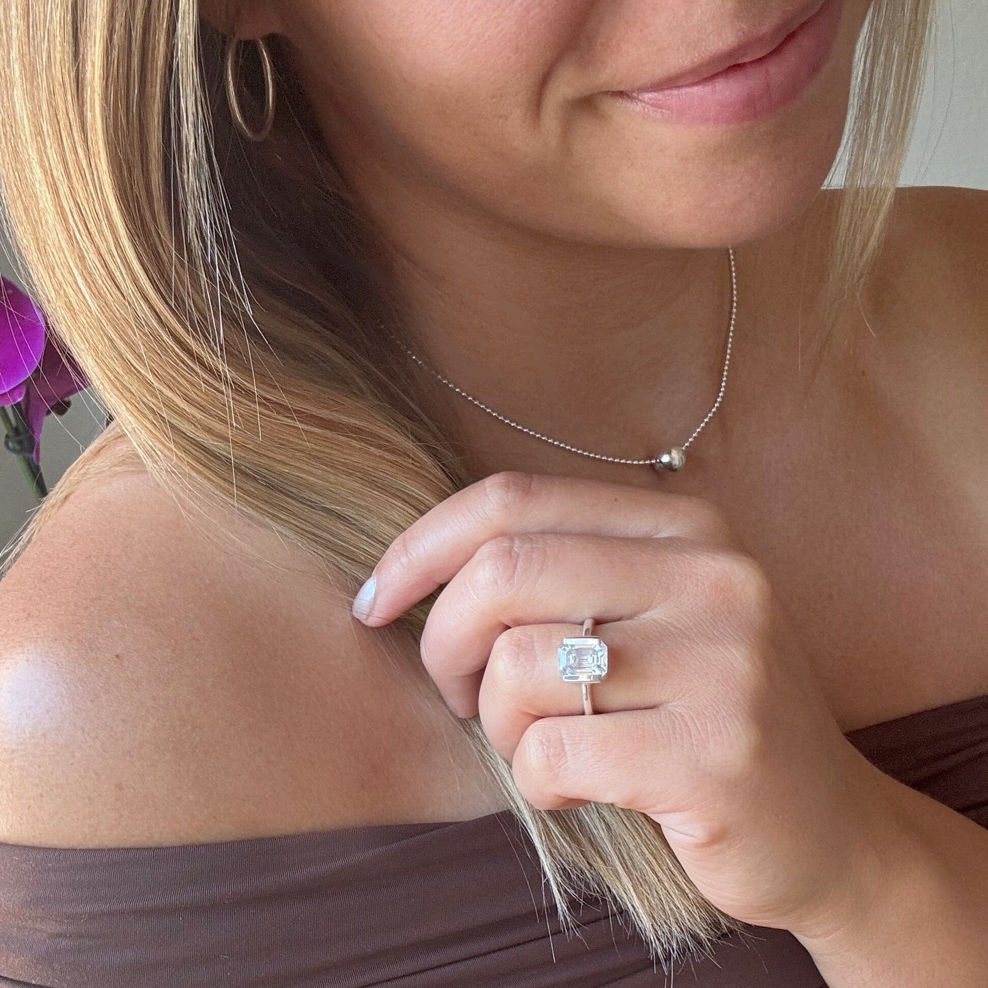 emerald cut Elevate Ring paired with Elementary My Dear Necklace and Cliff Hanger Earrings
