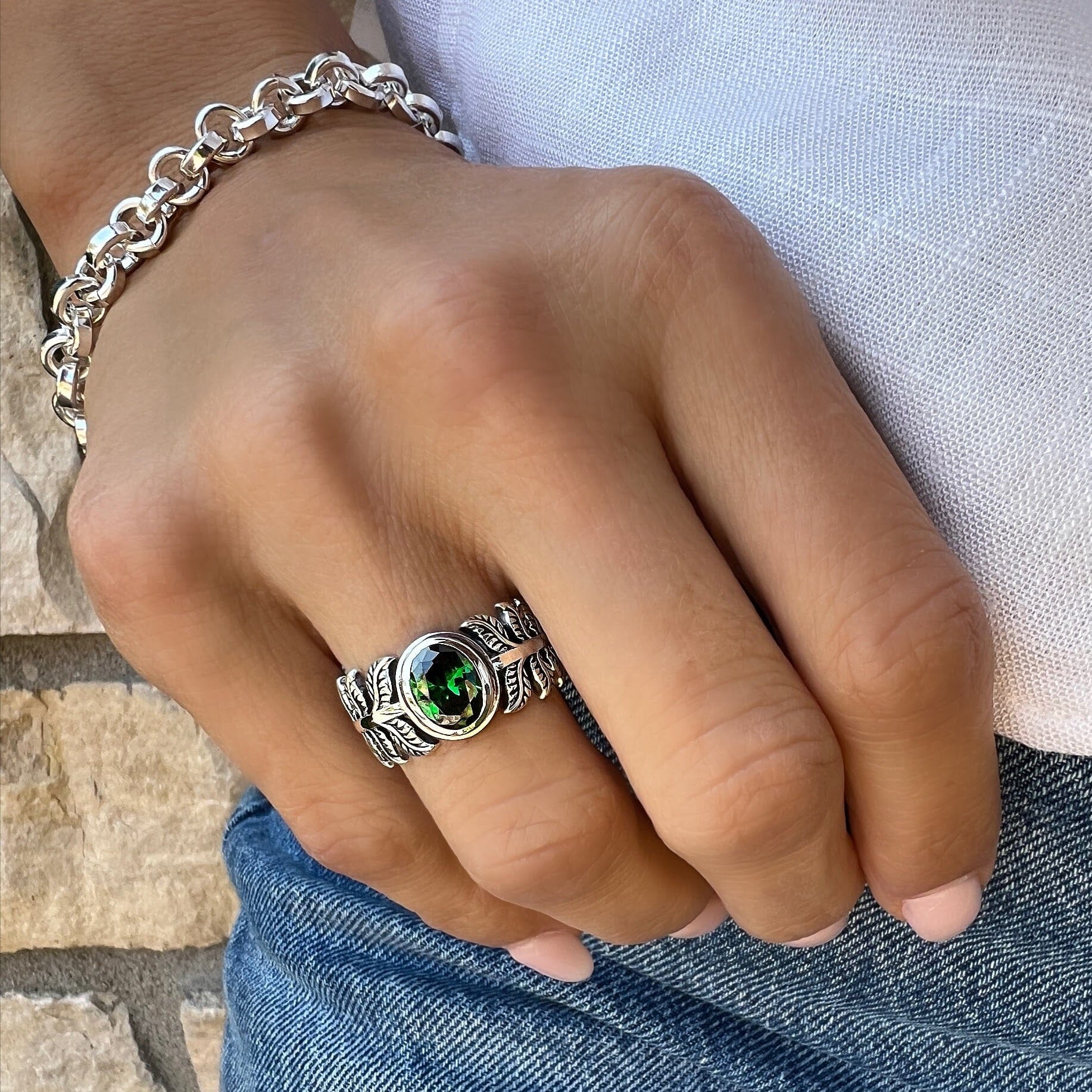 Emerald Palm Ring featuring oval emerald cz center