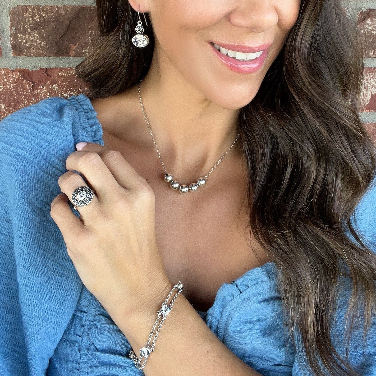 fiesta ring paired with cz rosemary earrings, cover story bracelet and silver miss priss necklace