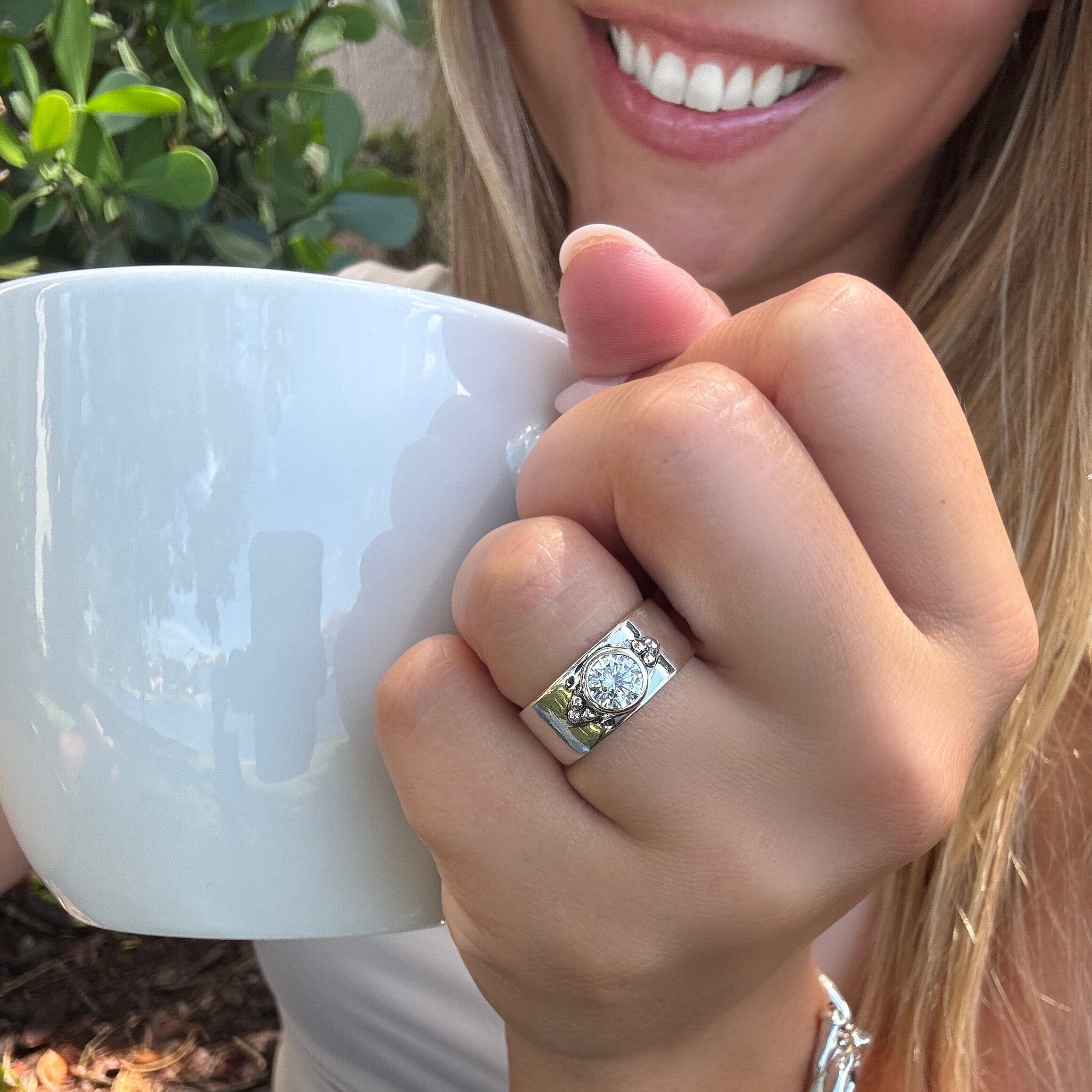 sterling silver high polished ring with a round clear Cubic zirconium stone