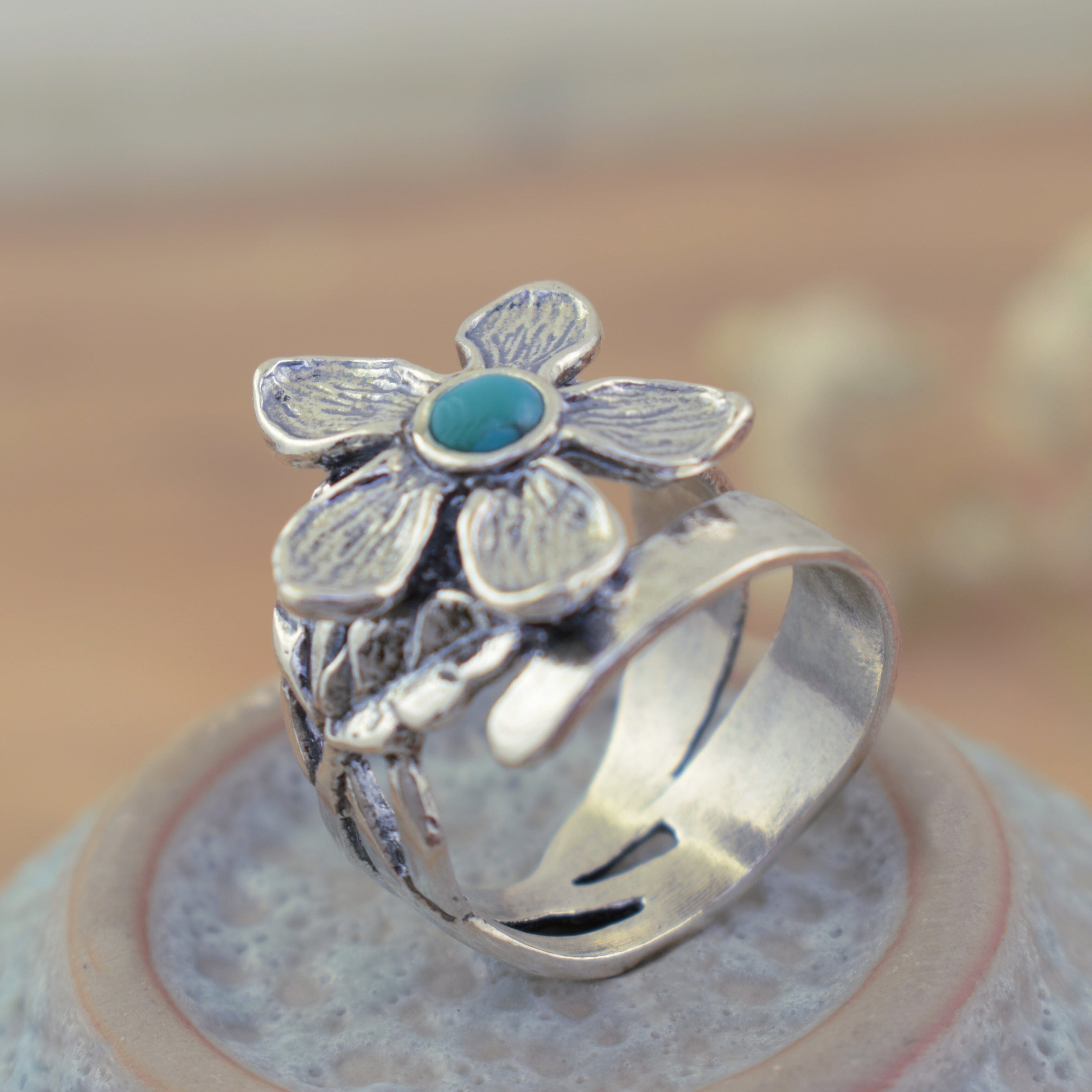 chunky turquoise ring with an organic floral style in sterling silver