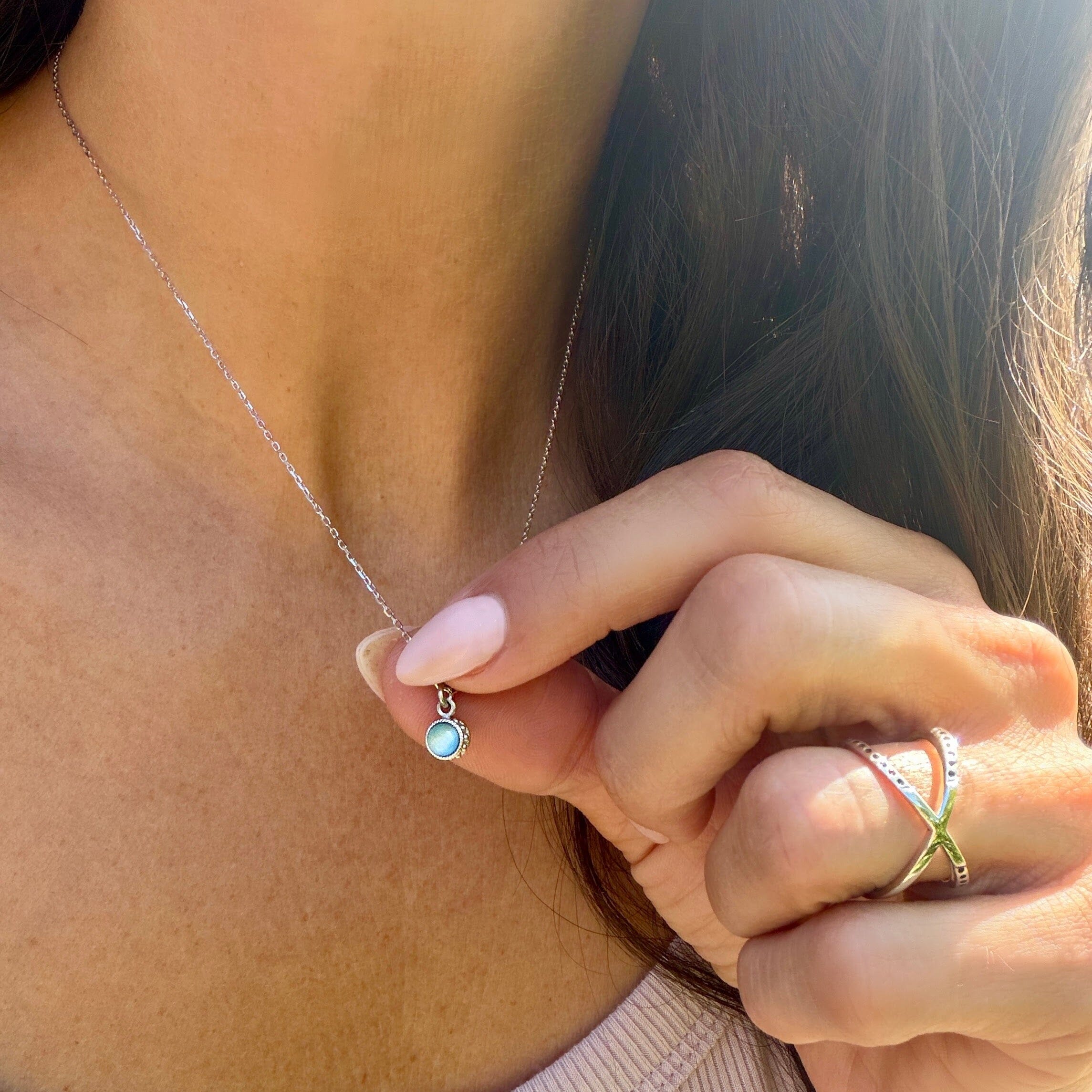 sterling silver and blue zircon stone