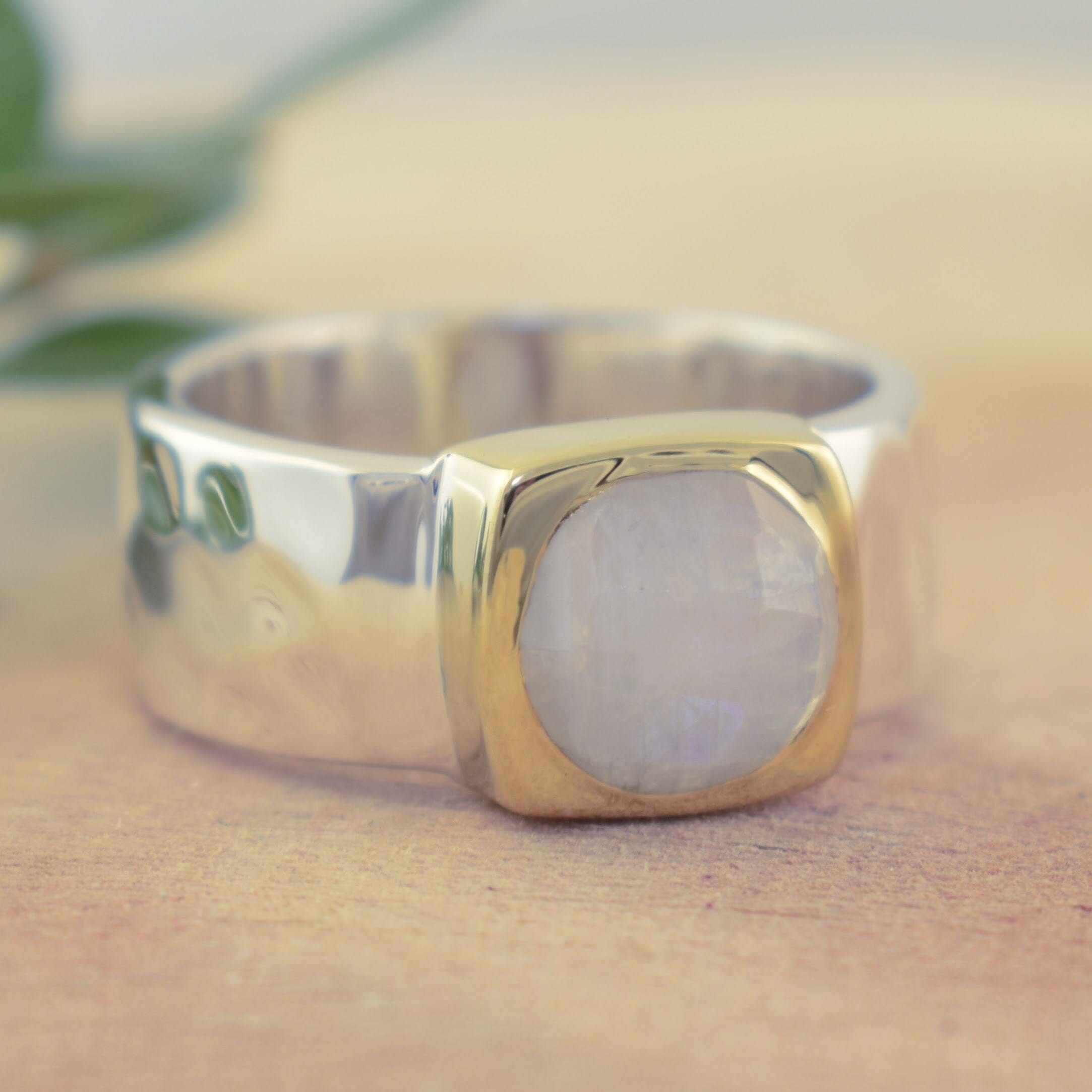 rainbow moon stone set in a brass bezel