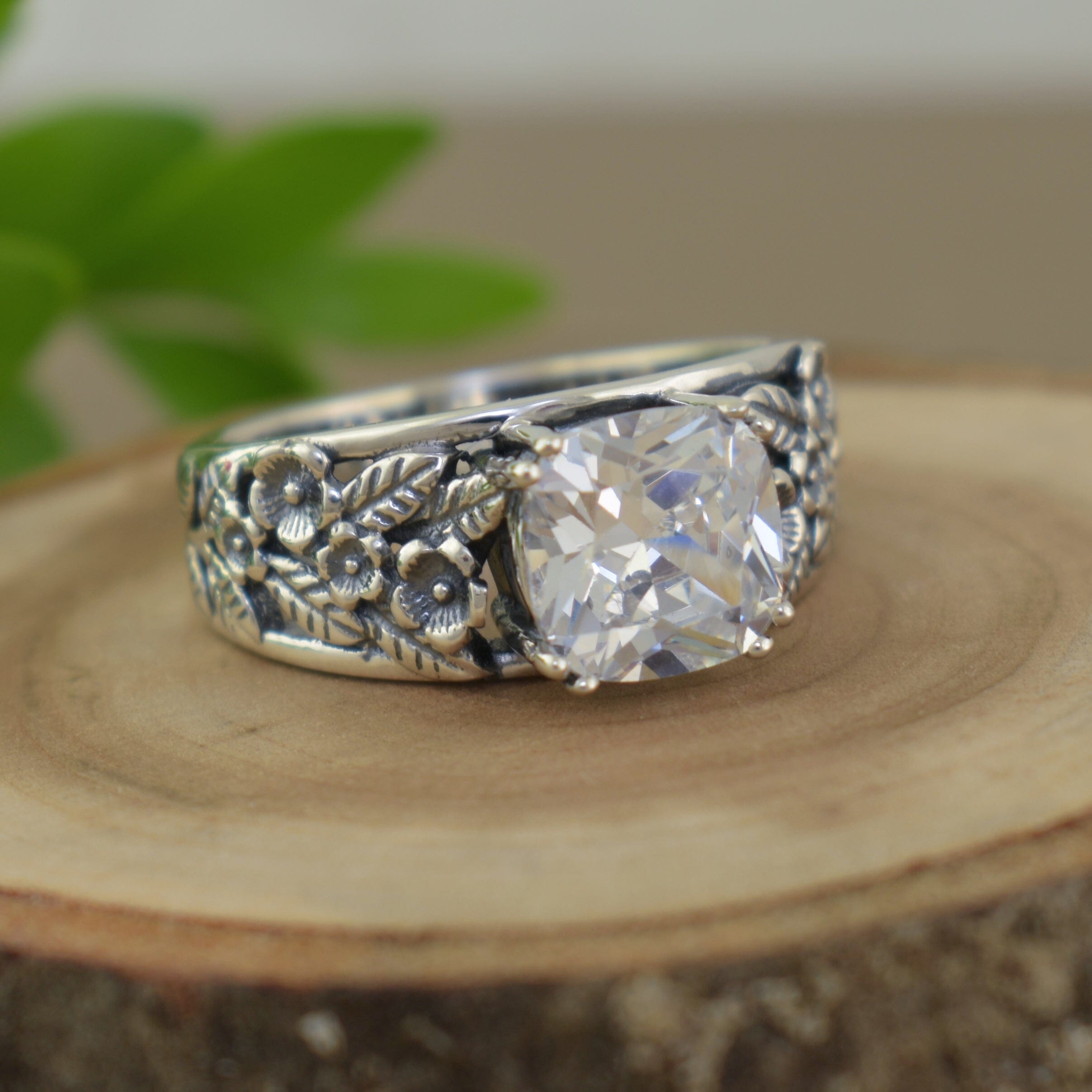Handcrafted .925 sterling silver garden-inspired ring featuring clear cubic zirconia