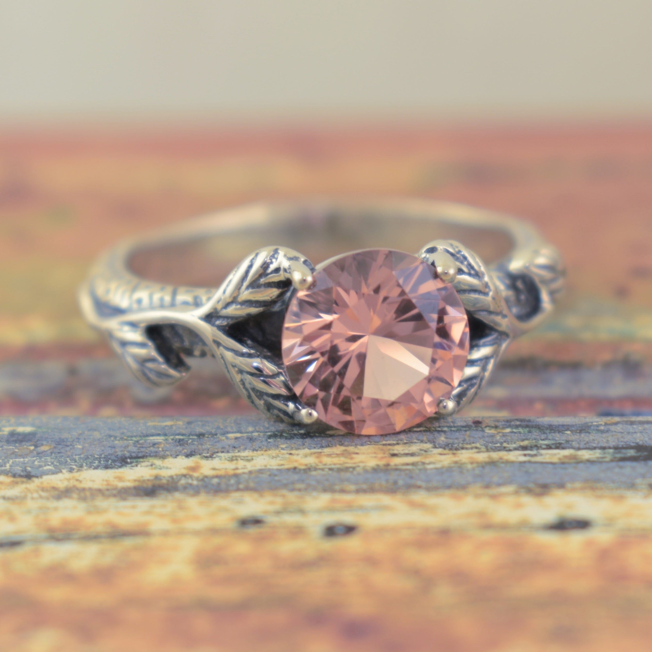 Silver ring with a peach morganite gemstone