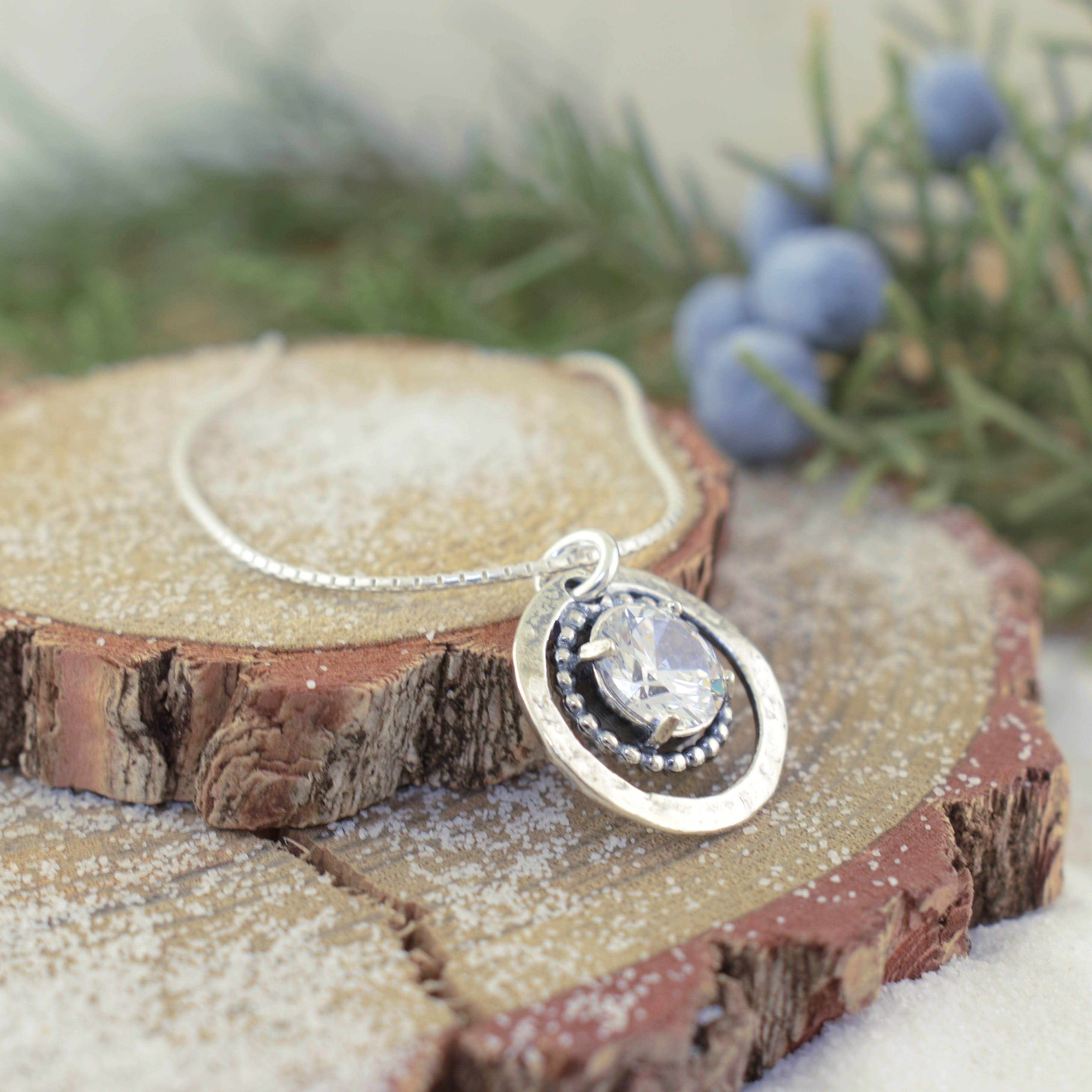 Sterling silver sleek necklace with a CZ stone prong set