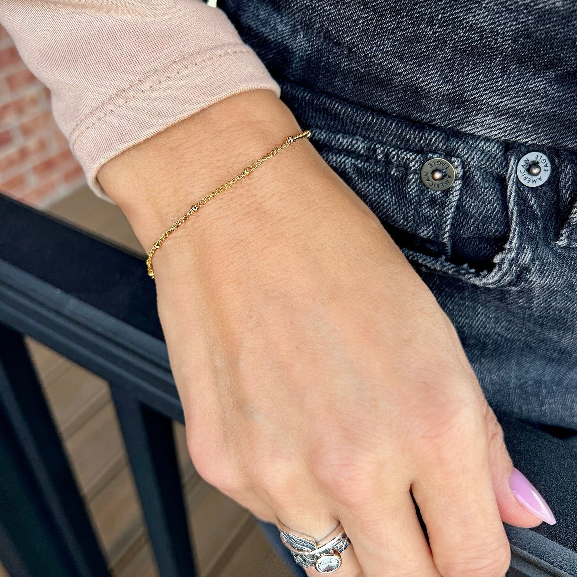 stainless steel and 18k gold plated bead station bracelet