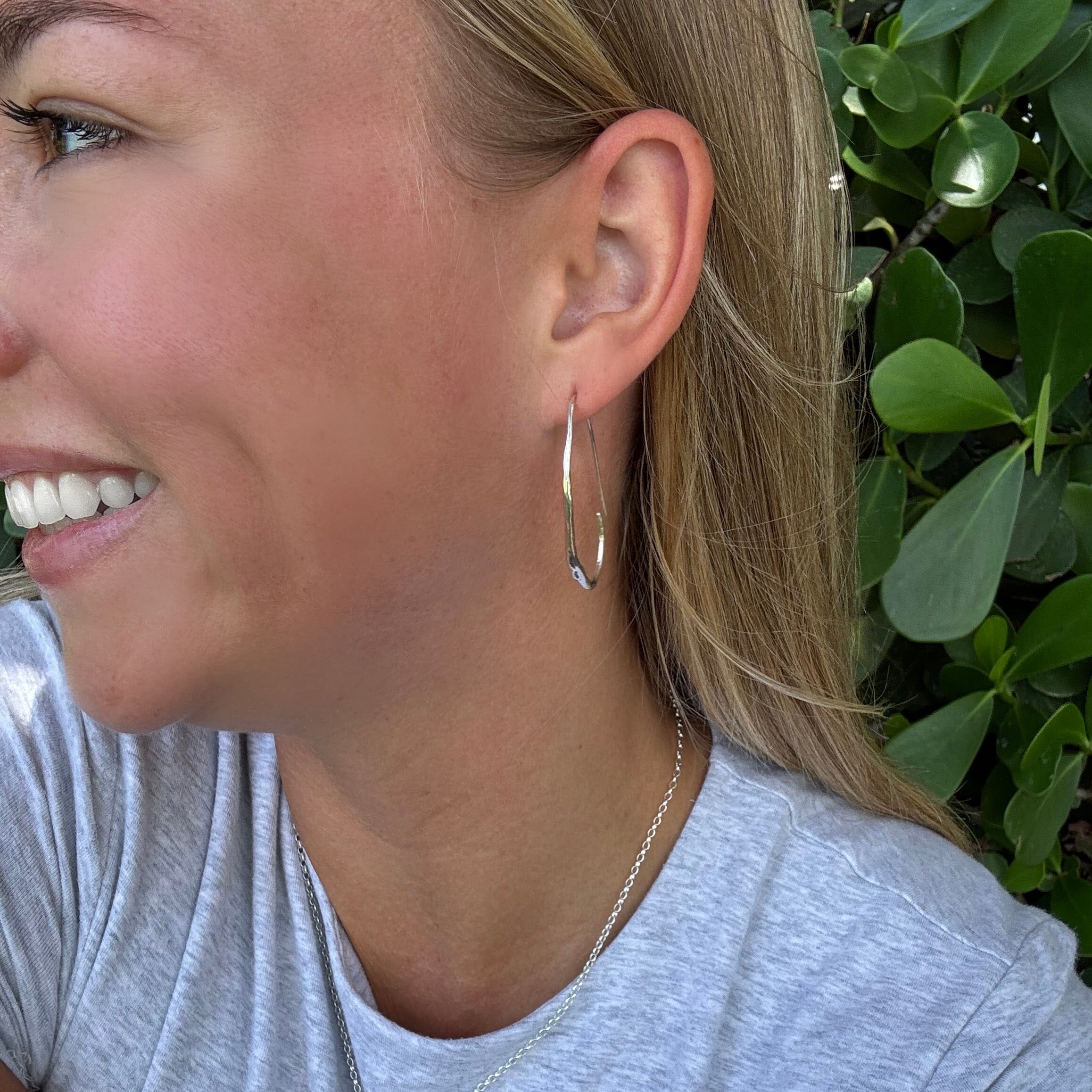 Hoop earrings with a high polished oxidized finish